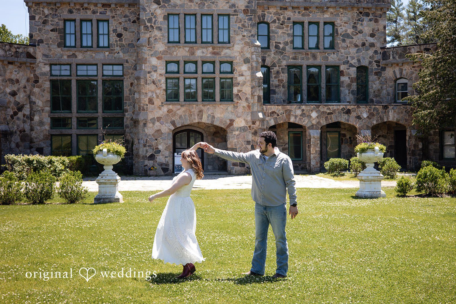 Romantic twirl pose of the engaged couple at Borderland State Park