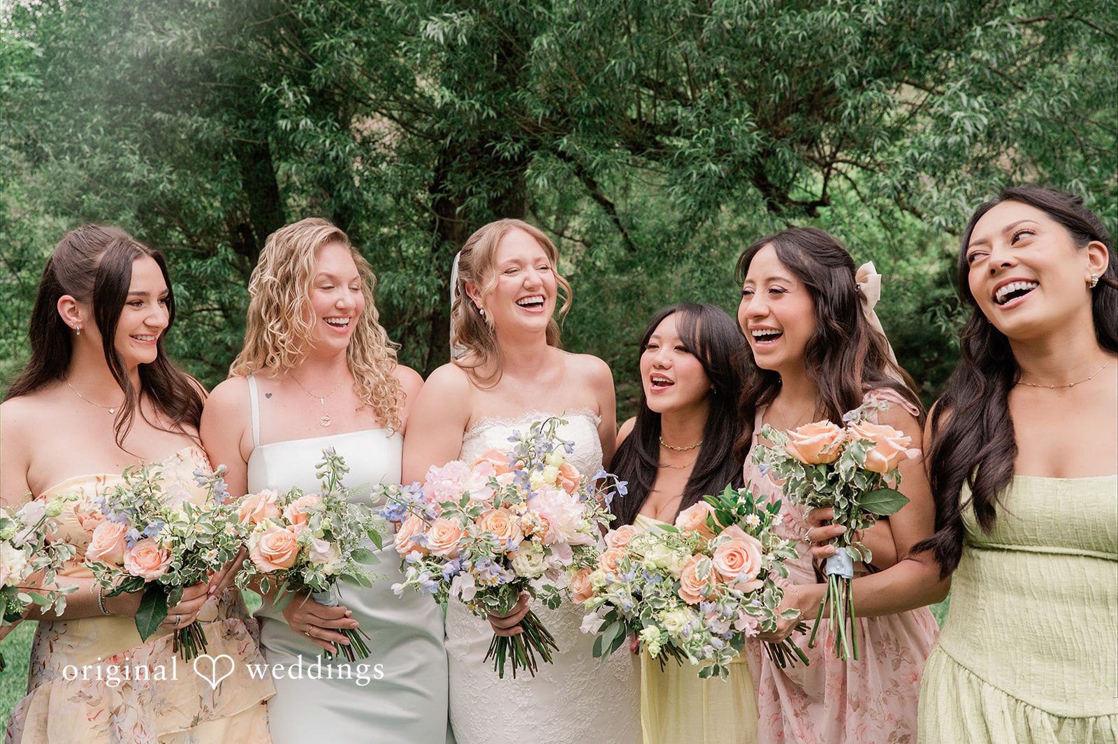 Bonnie + Tommie A joyful portrait of the bride and her bridesmaids