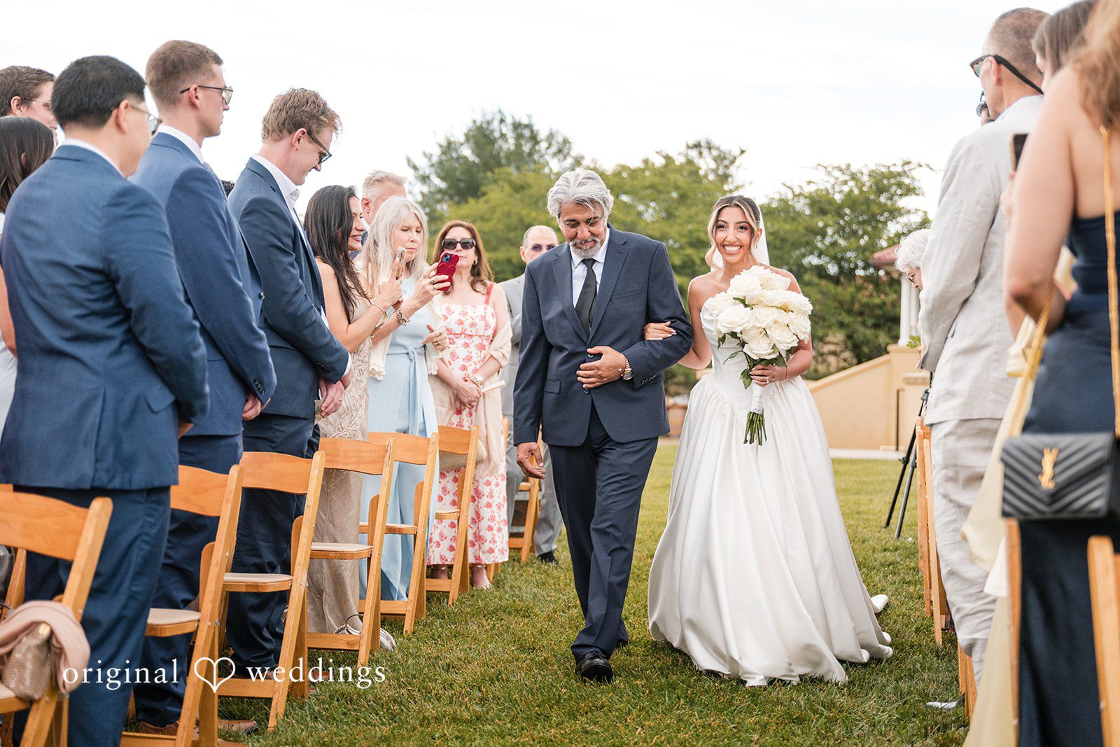 Brett + Ava Lovely bride walking down the aisle with someone