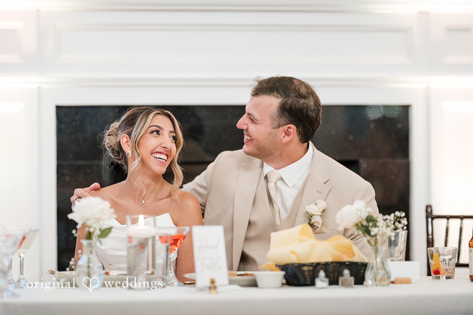 Brett + Ava Couple looking at each other with joy at Breaux Vineyards captured by DC wedding photographers from Original Weddings