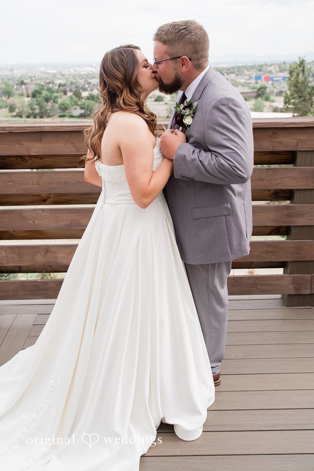 Carolina + Jonah Bride and groom sharing a romantic kiss at Brittany Hill - Wedgewood Weddings