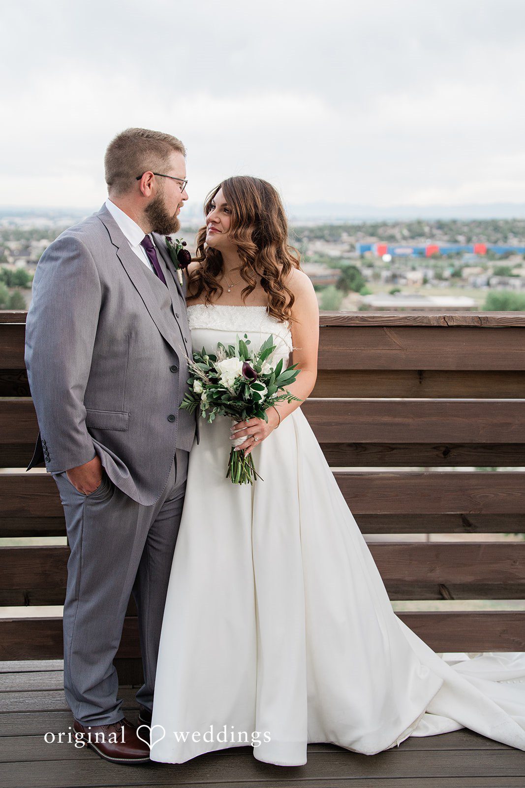 Carolina + Jonah Couple looking at each other during their portrait session at Brittany Hill - Wedgewood Weddings