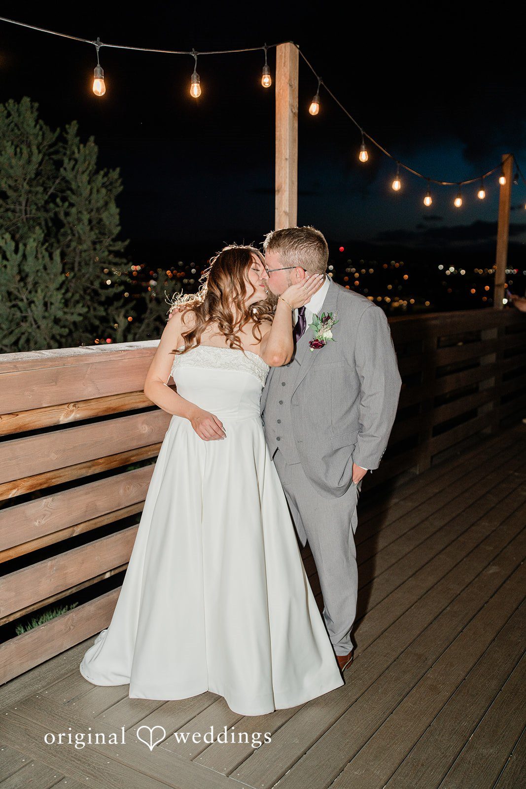 Carolina + Jonah Couple sharing a romantic kiss during their portrait session at Brittany Hill - Wedgewood Weddings