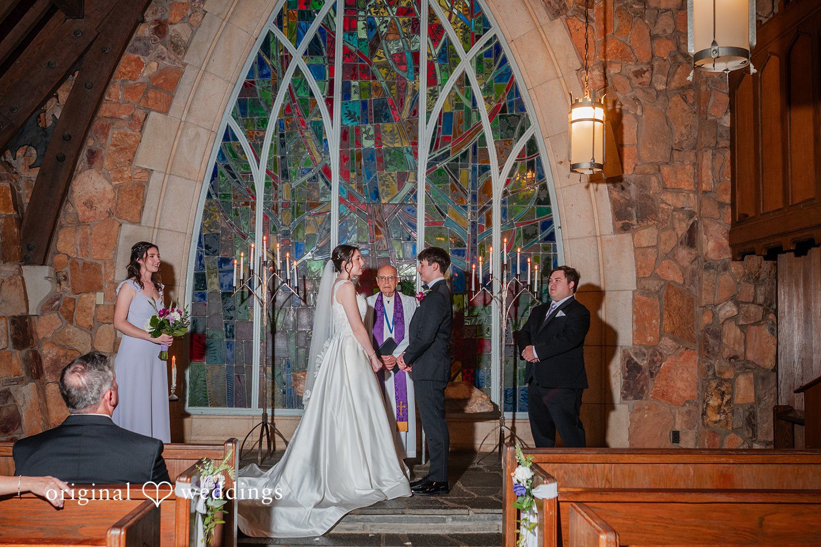 Jacob + Jadee Bride and groom sharing an emotional ceremony moment at Callaway Gardens Ida Memorial Chapel