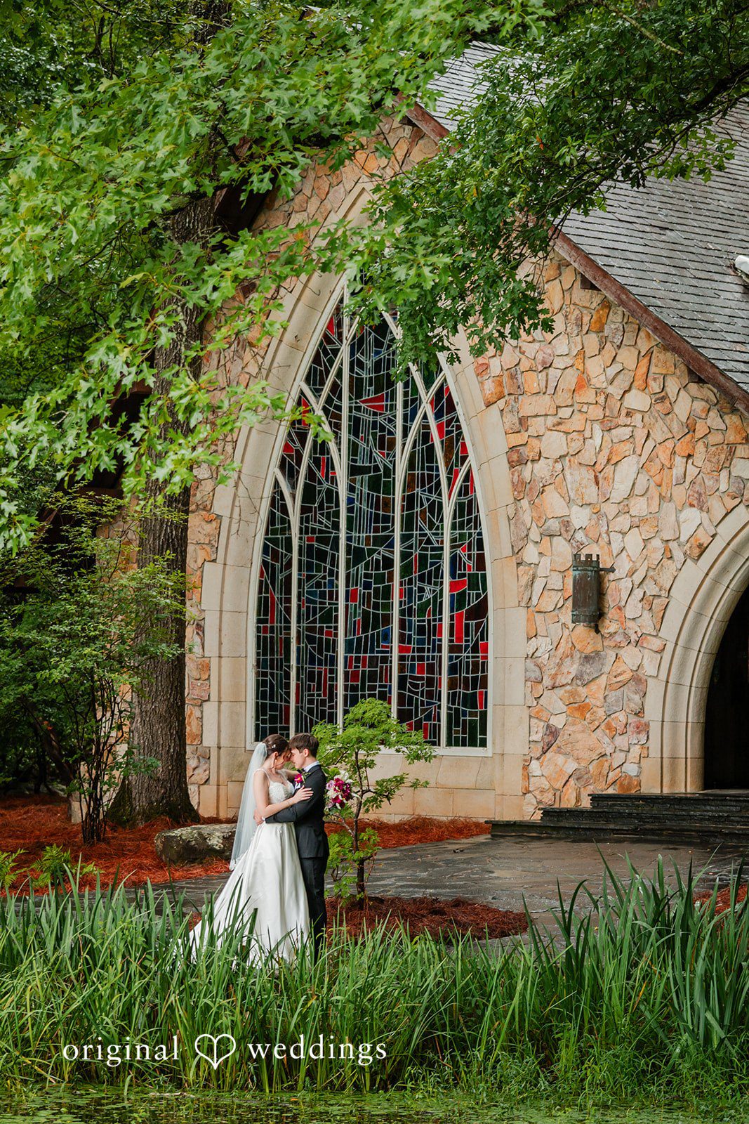 Jacob + Jadee Outdoor wedding portrait beside Callaway Gardens Ida Memorial Chapel captured by Atlanta Wedding Photographers from Original Weddings.