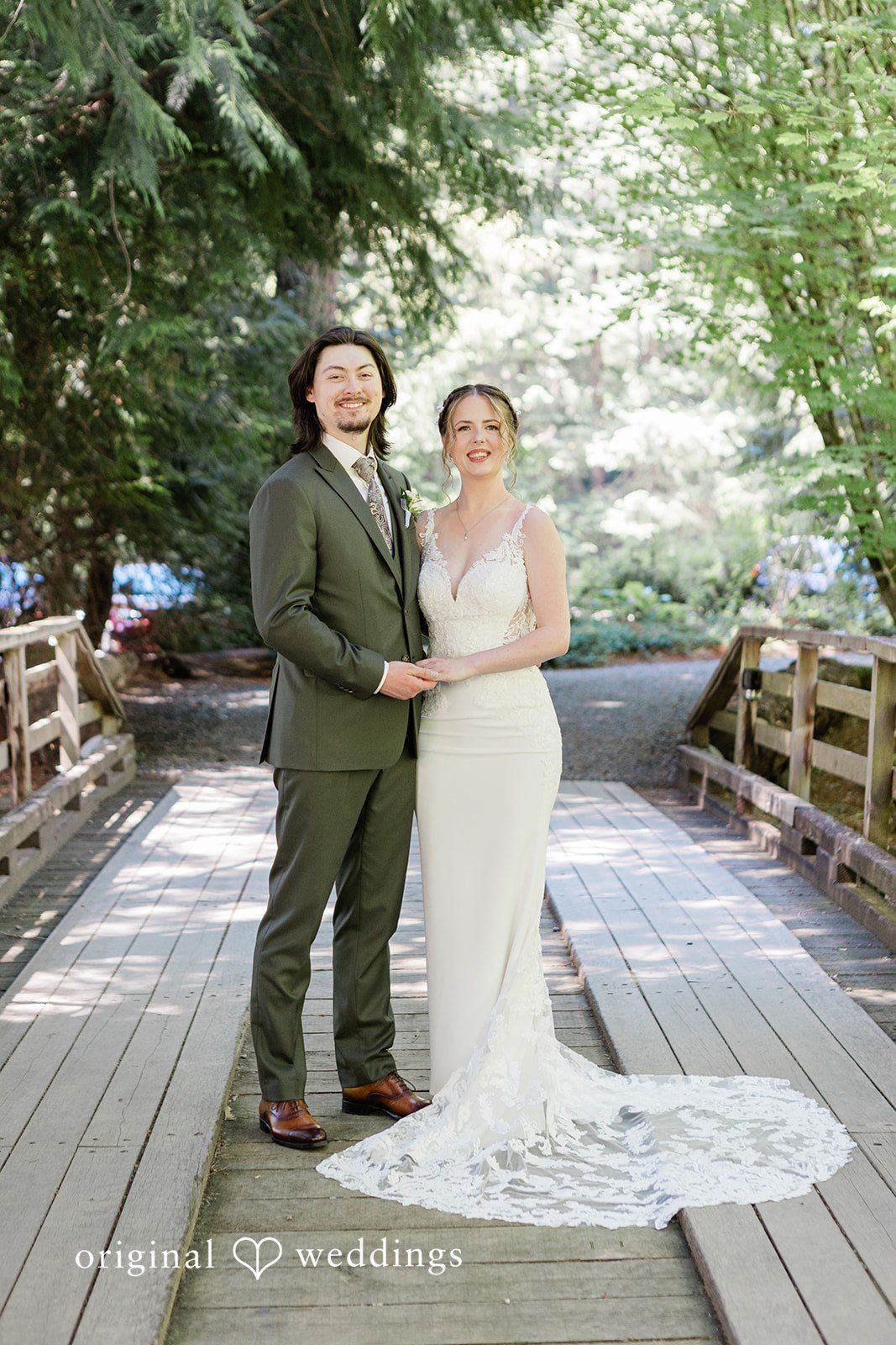 Jennifer + Steven Couple looking at the camera while posing together at cedar springs