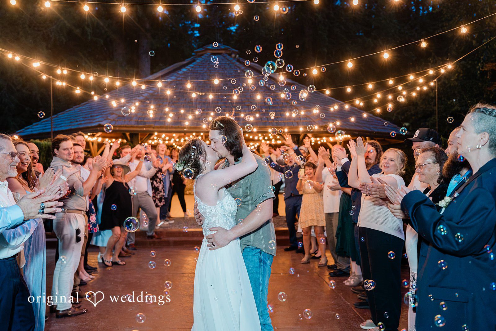 Jennifer + Steven Bride and groom kissing during their reception at cedar springs