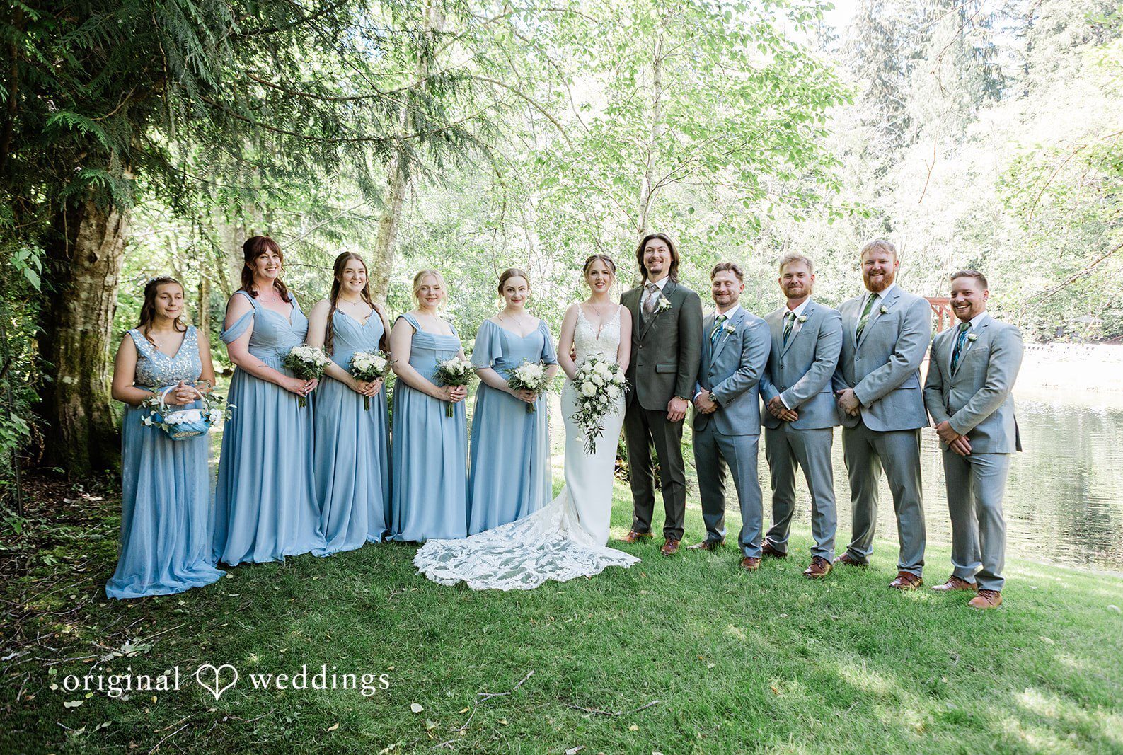 Seattle wedding photographers capturing couple with bridesmaids and groomsmen at cedar springs by Original Weddings