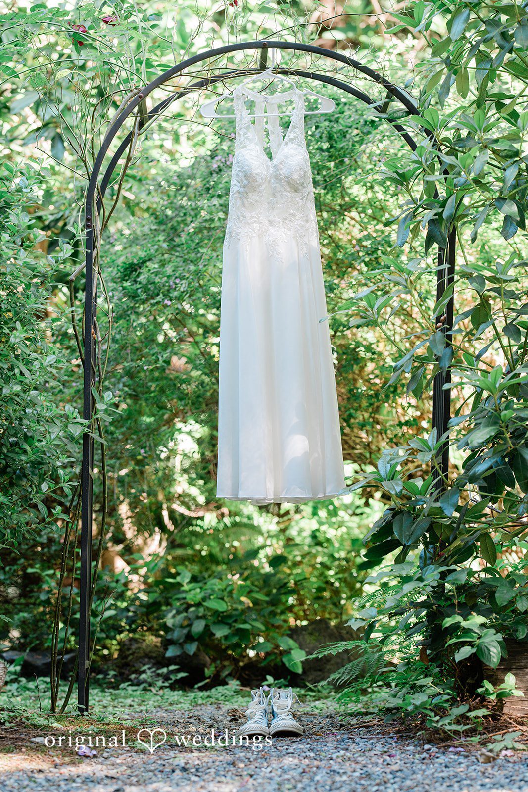 Jennifer + Steven Elegant bridal dress hanging for a portrait at cedar springs