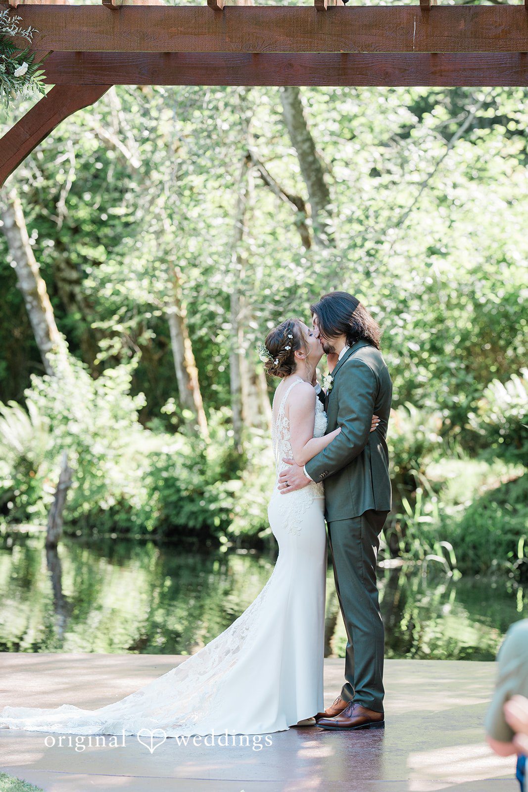 Jennifer + Steven Couple sharing a romantic kiss at cedar springs