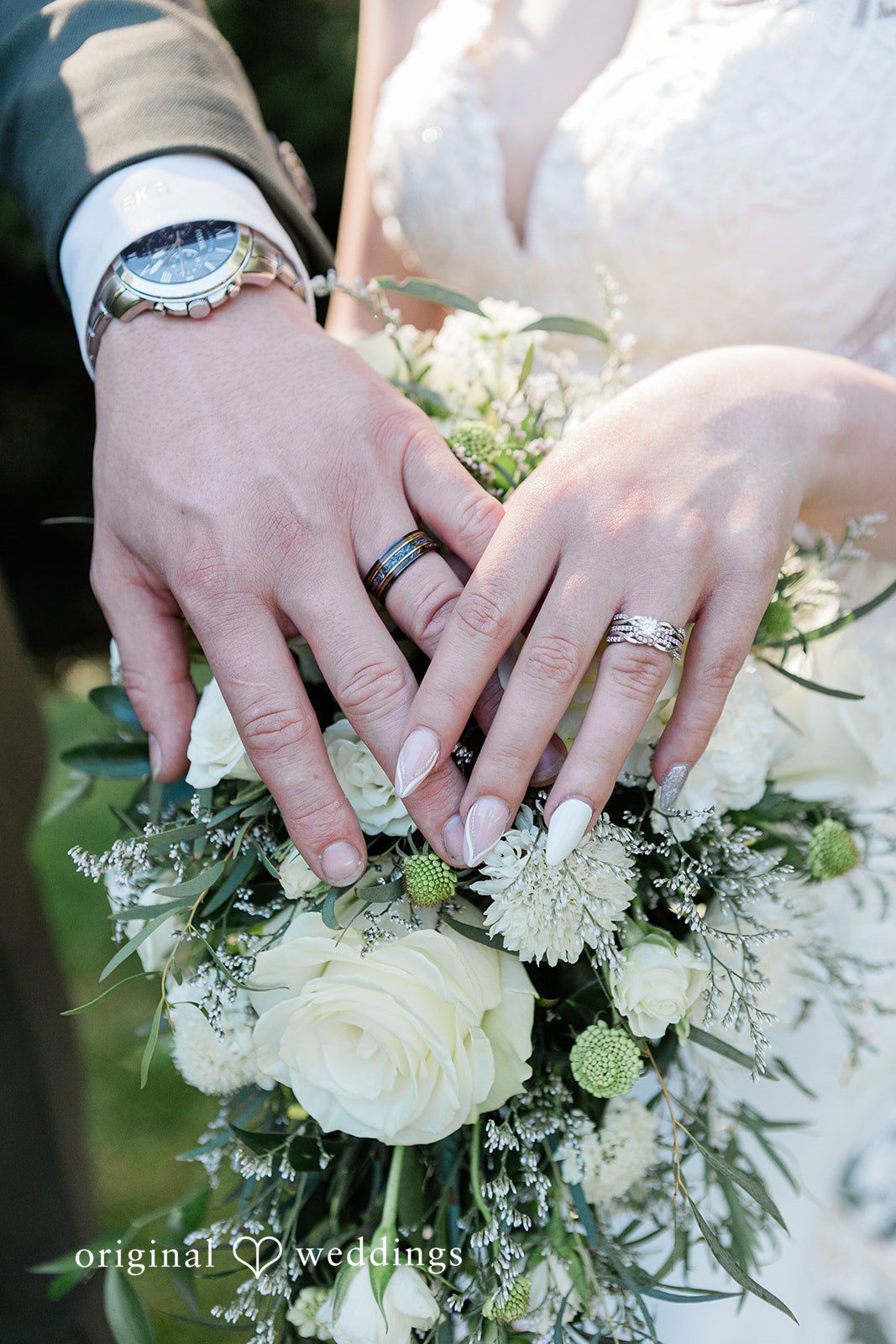 Jennifer + Steven Close-up of the bride and groom's wedding rings at cedar springs
