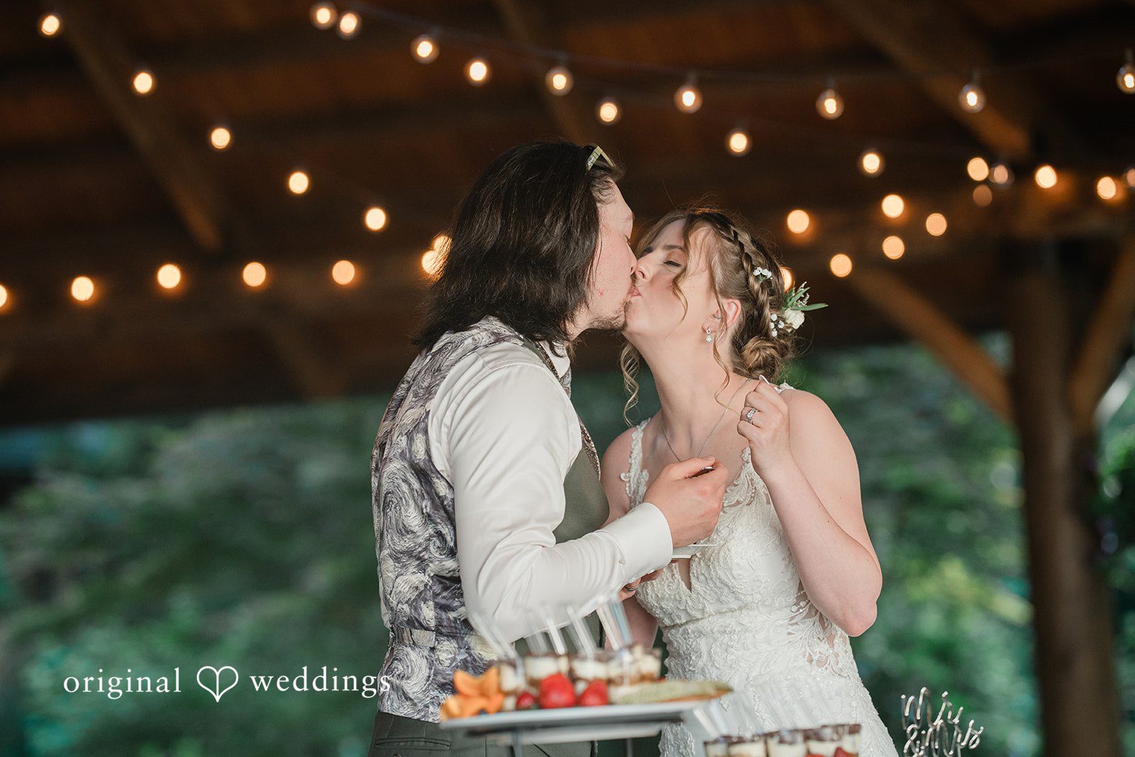 Jennifer + Steven Bride and groom kissing during their reception at cedar springs