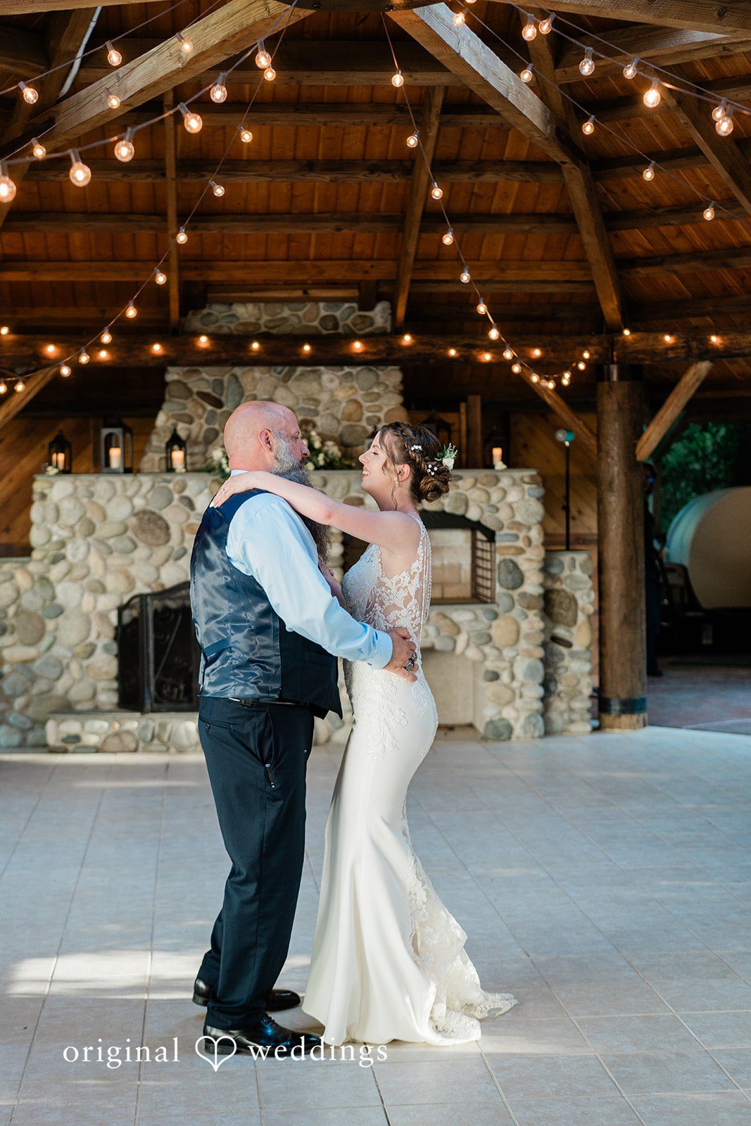 Jennifer + Steven Bride enjoying a dance with someone during the reception at cedar springs