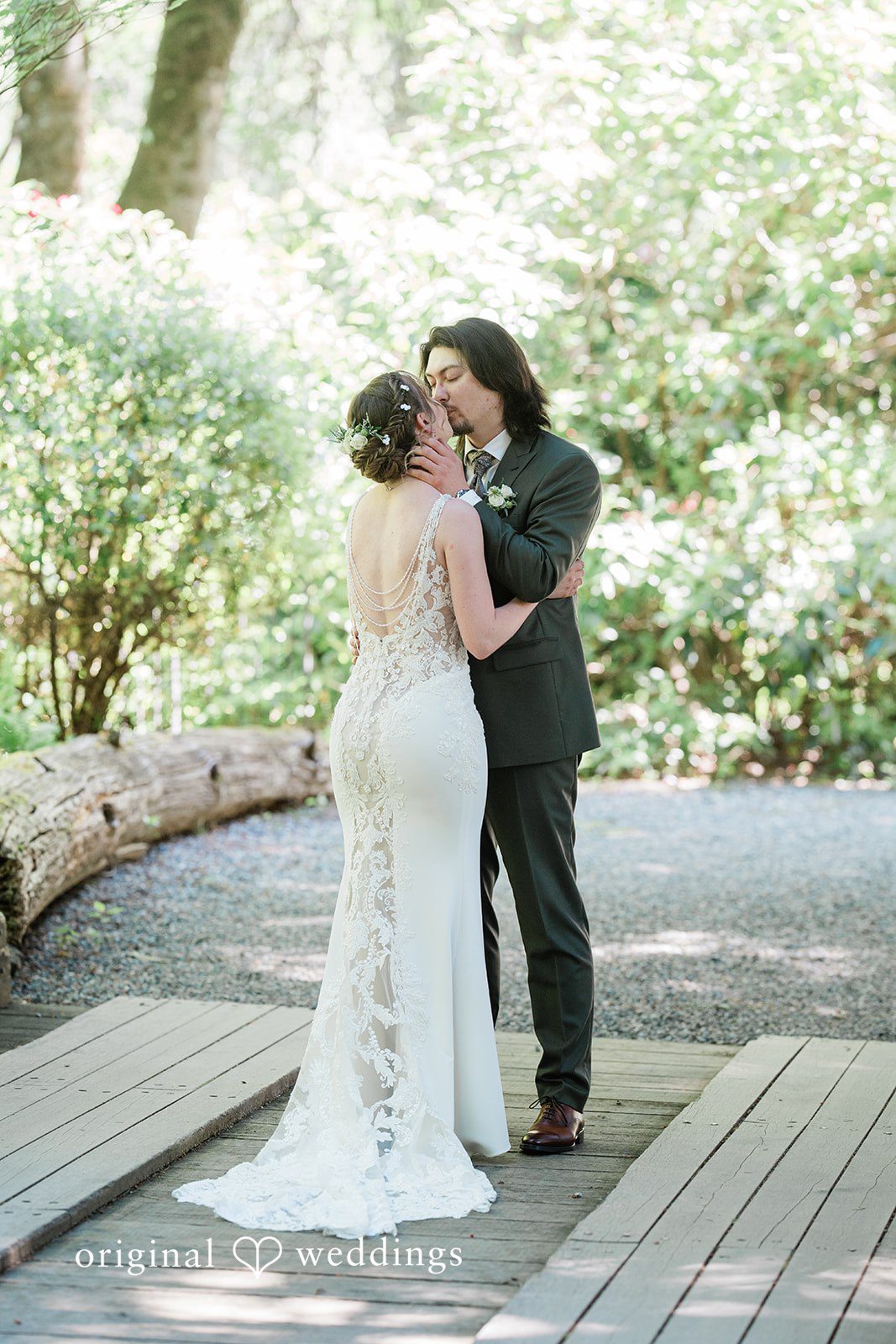 Jennifer + Steven Bride and groom kissing during their portrait session at cedar springs
