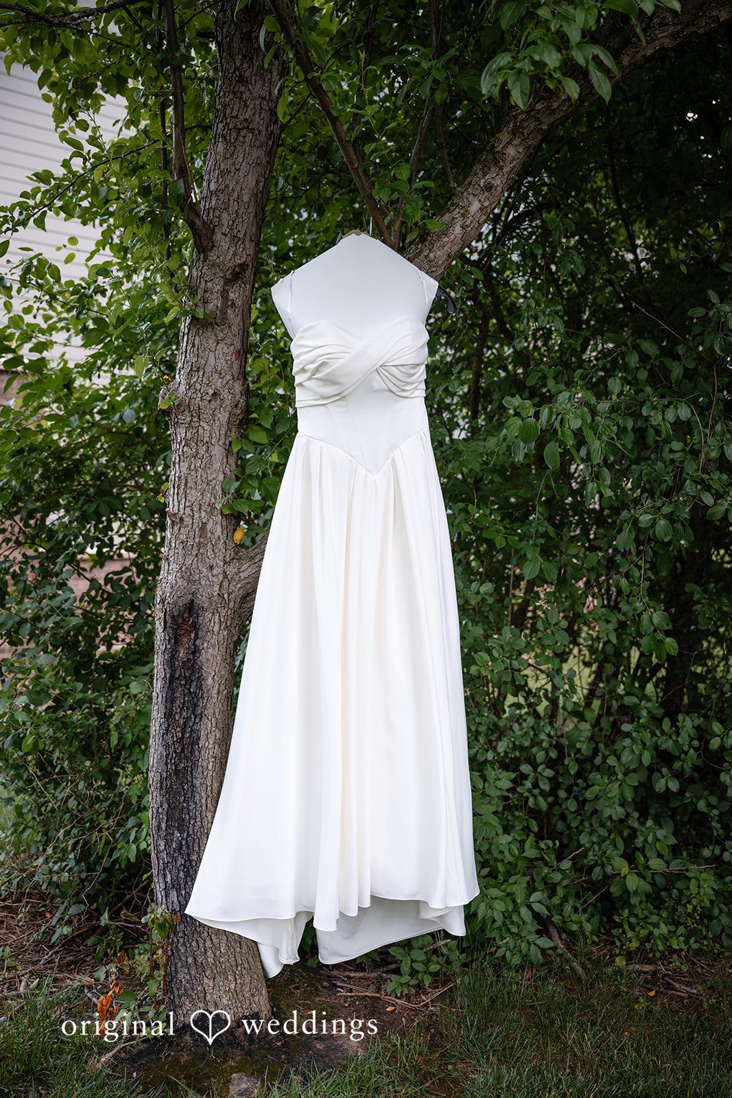 Brandi + Ryan Beautiful bridal gown hanging at Christ the Lord Lutheran Church
