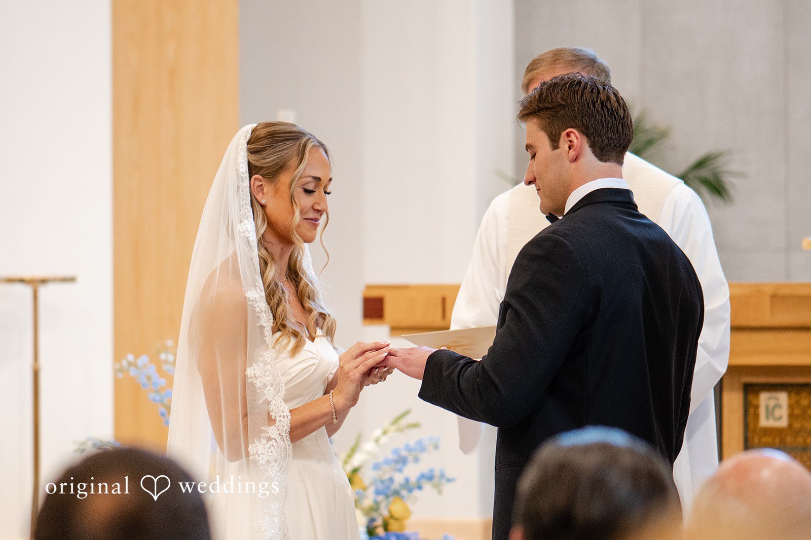 Brandi + Ryan Wedding ceremony at Christ the Lord Lutheran Church captured by Milwaukee Wedding Photographers from Original Weddings