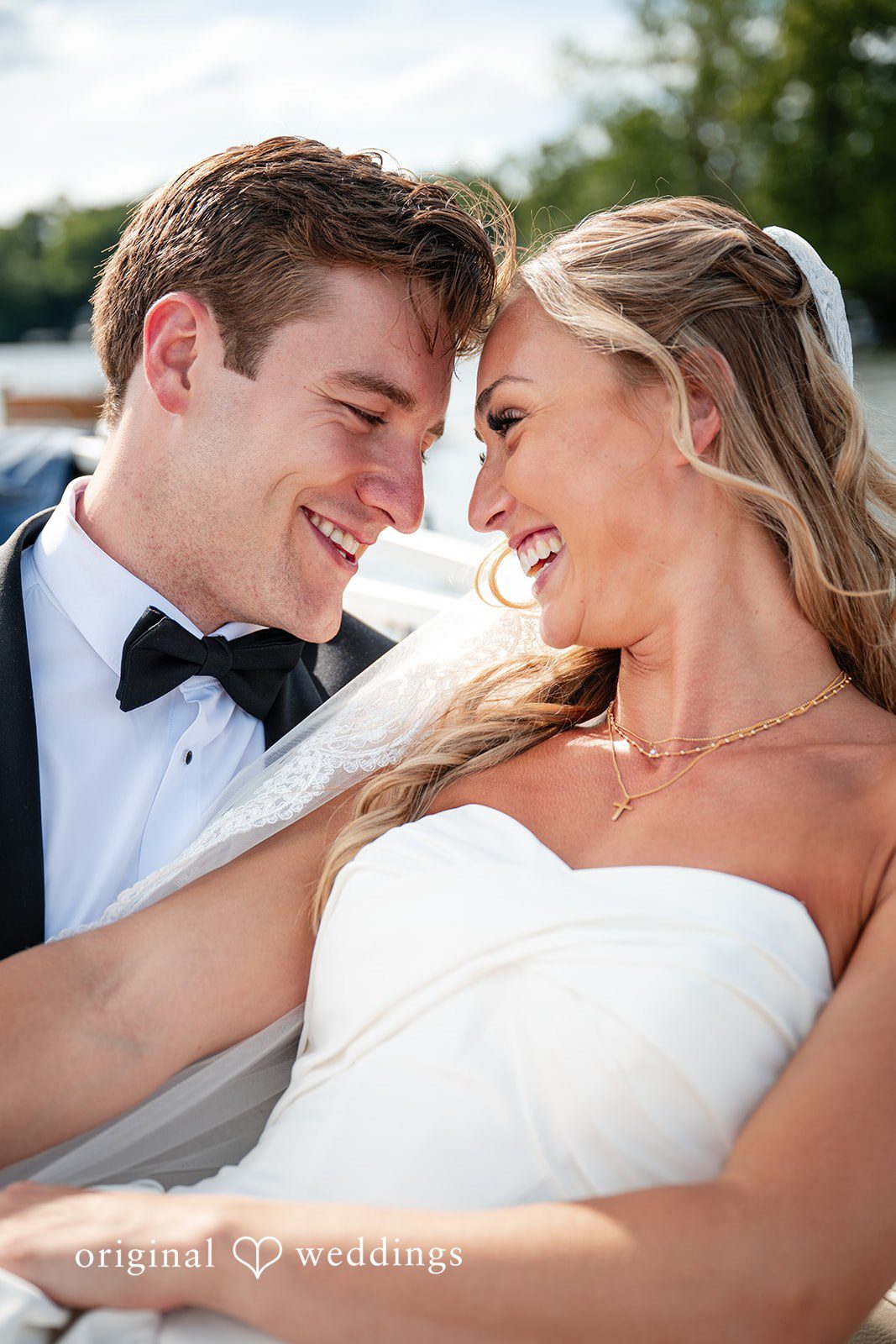 Brandi + Ryan Bride and groom smiling together at Christ the Lord Lutheran Church