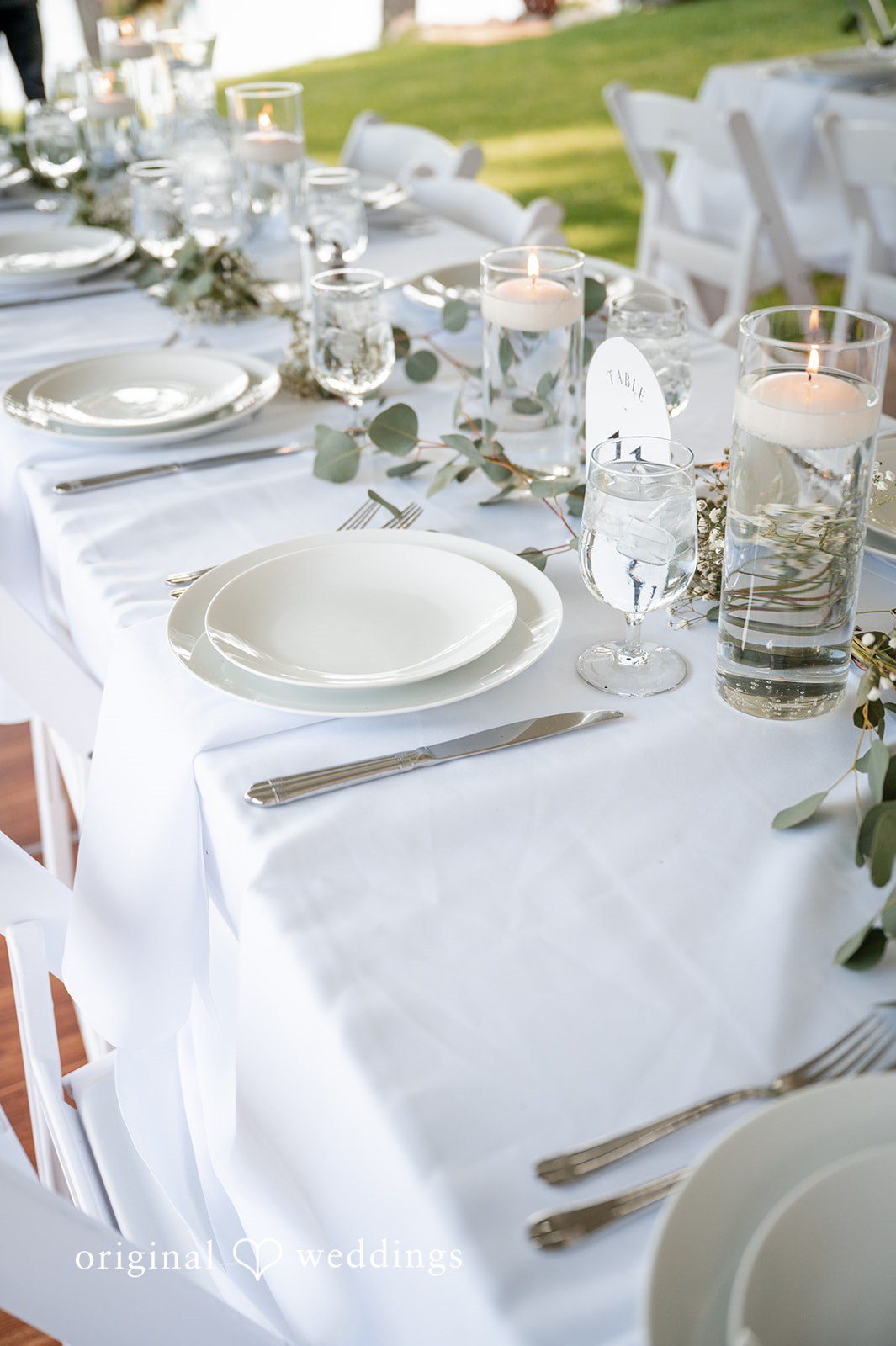Brandi + Ryan Close-up of the reception table at Christ the Lord Lutheran Church