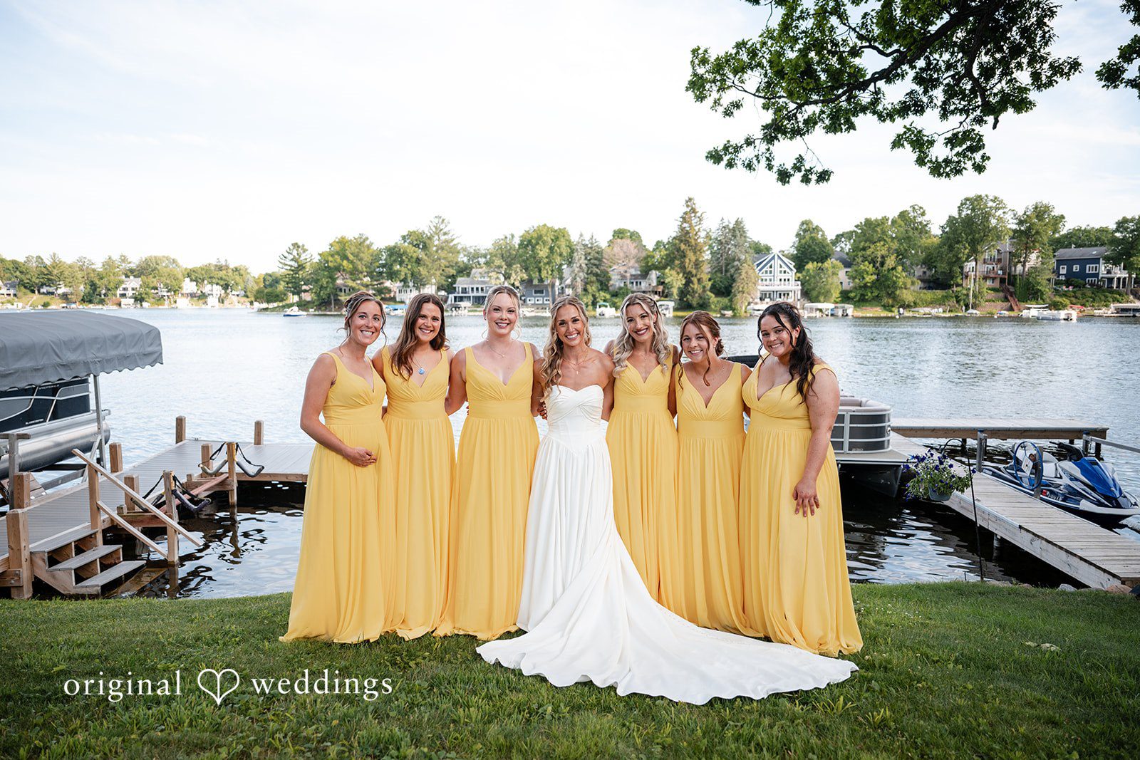 Brandi + Ryan Bride posing with the bridesmaids before the ceremony.