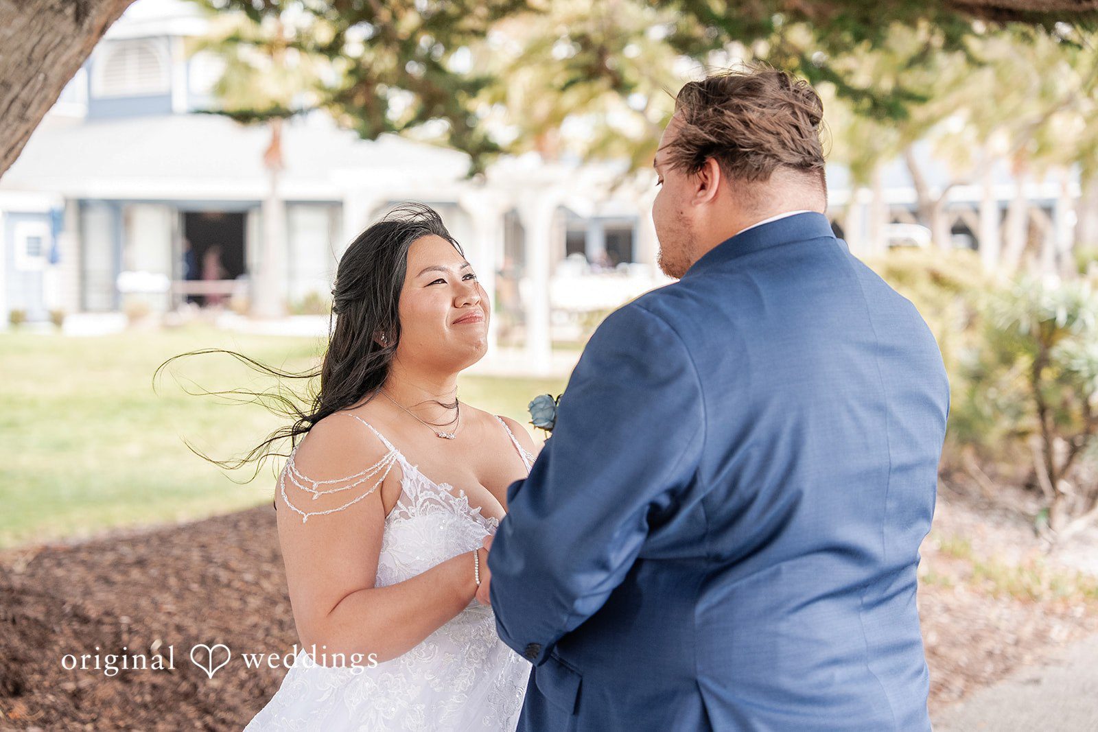 Thuy + Ryan Bride and groom sharing a joyful smile together