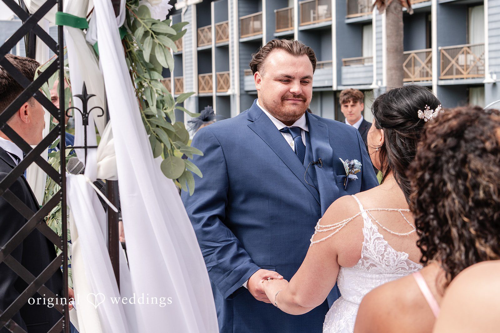 Thuy + Ryan Groom looking bride with smile at Double Tree by Hilton Hotel Berkeley