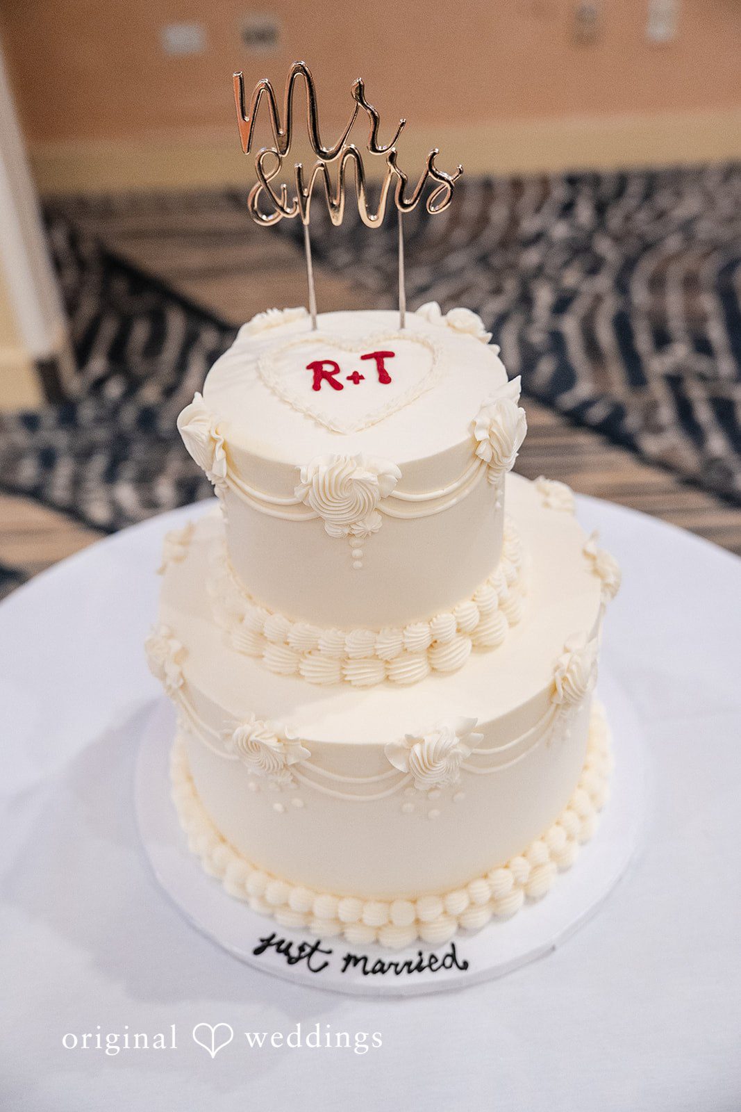 Thuy + Ryan Beautifully designed multi-tier wedding cake ready for the reception