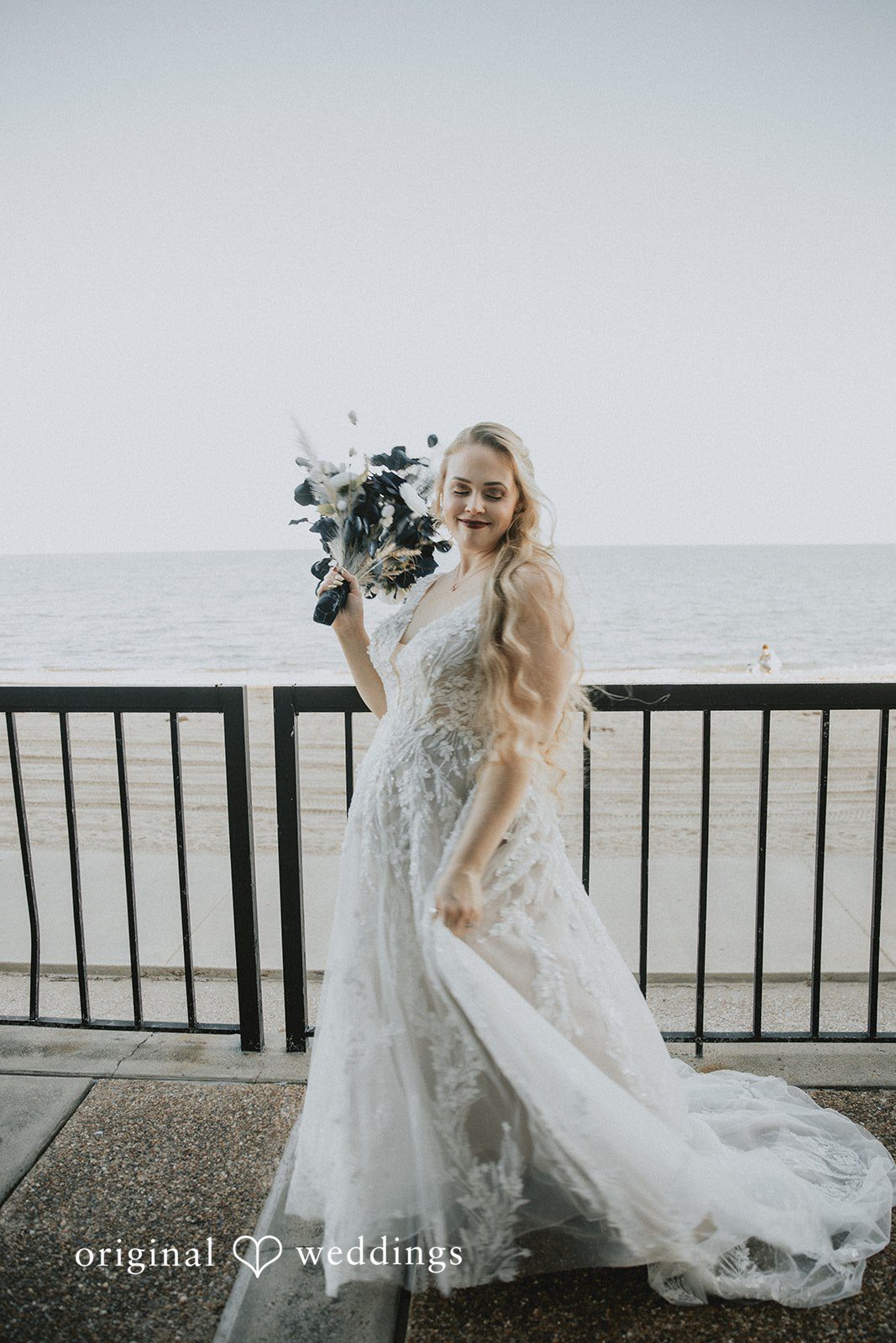 Allison + Justin Bride holding bouquet at DoubleTree by Hilton Corpus Christi Beachfront