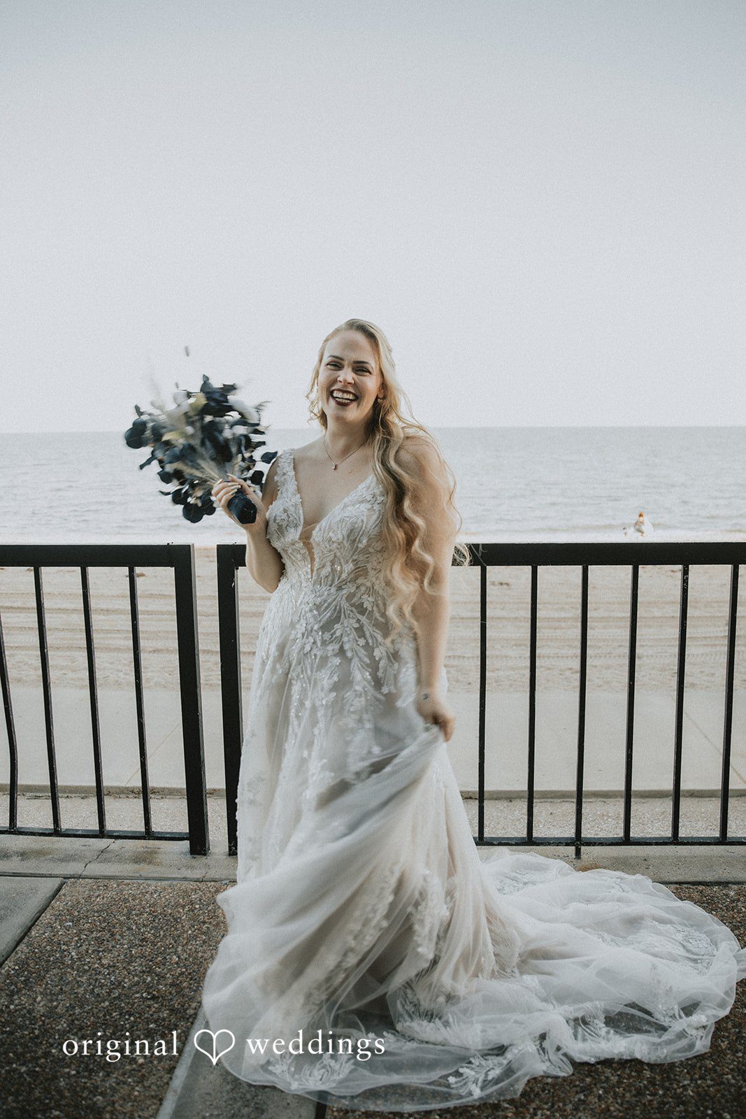 Allison + Justin Bride smiling with bouquet at DoubleTree by Hilton Corpus Christi Beachfront