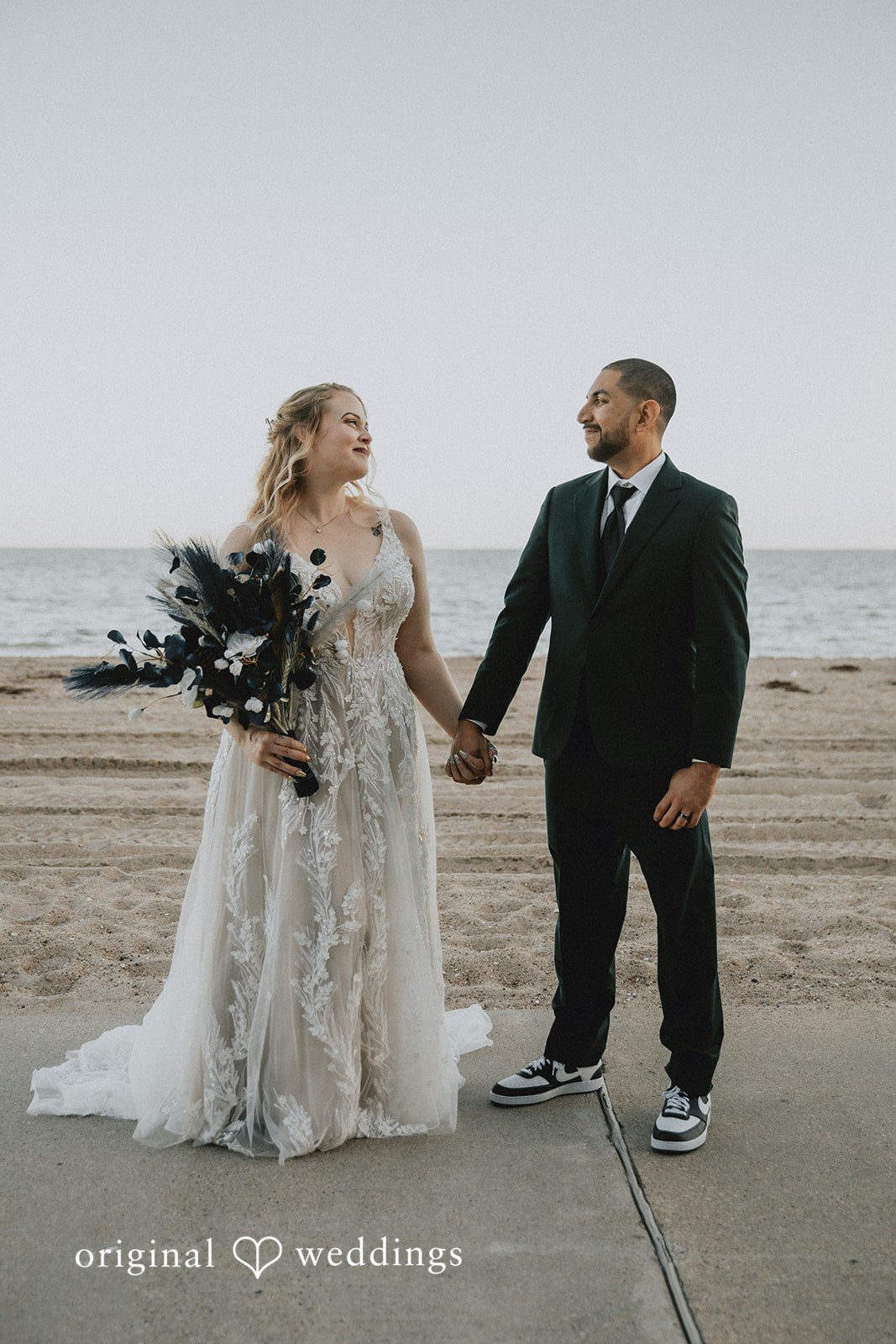 Allison + Justin Bride and groom looking at each other at DoubleTree by Hilton Corpus Christi Beachfront