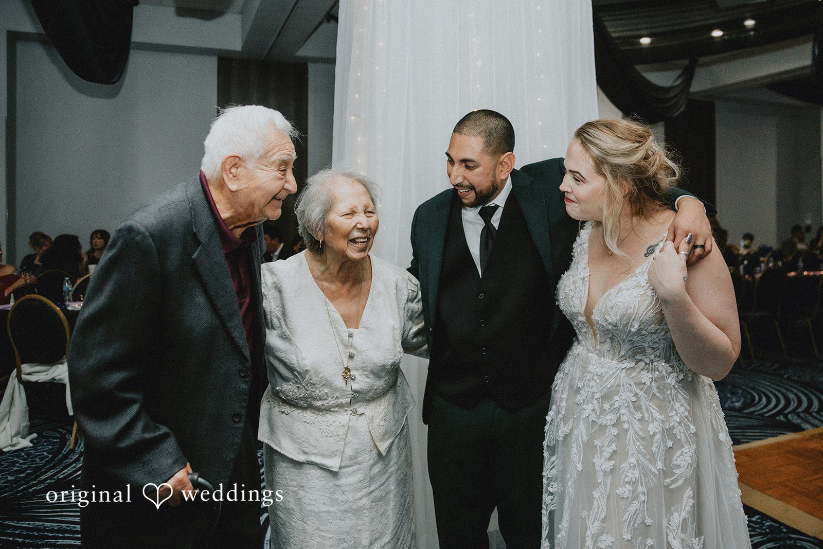 Allison + Justin Family group photo with the couple at DoubleTree by Hilton Corpus Christi Beachfront