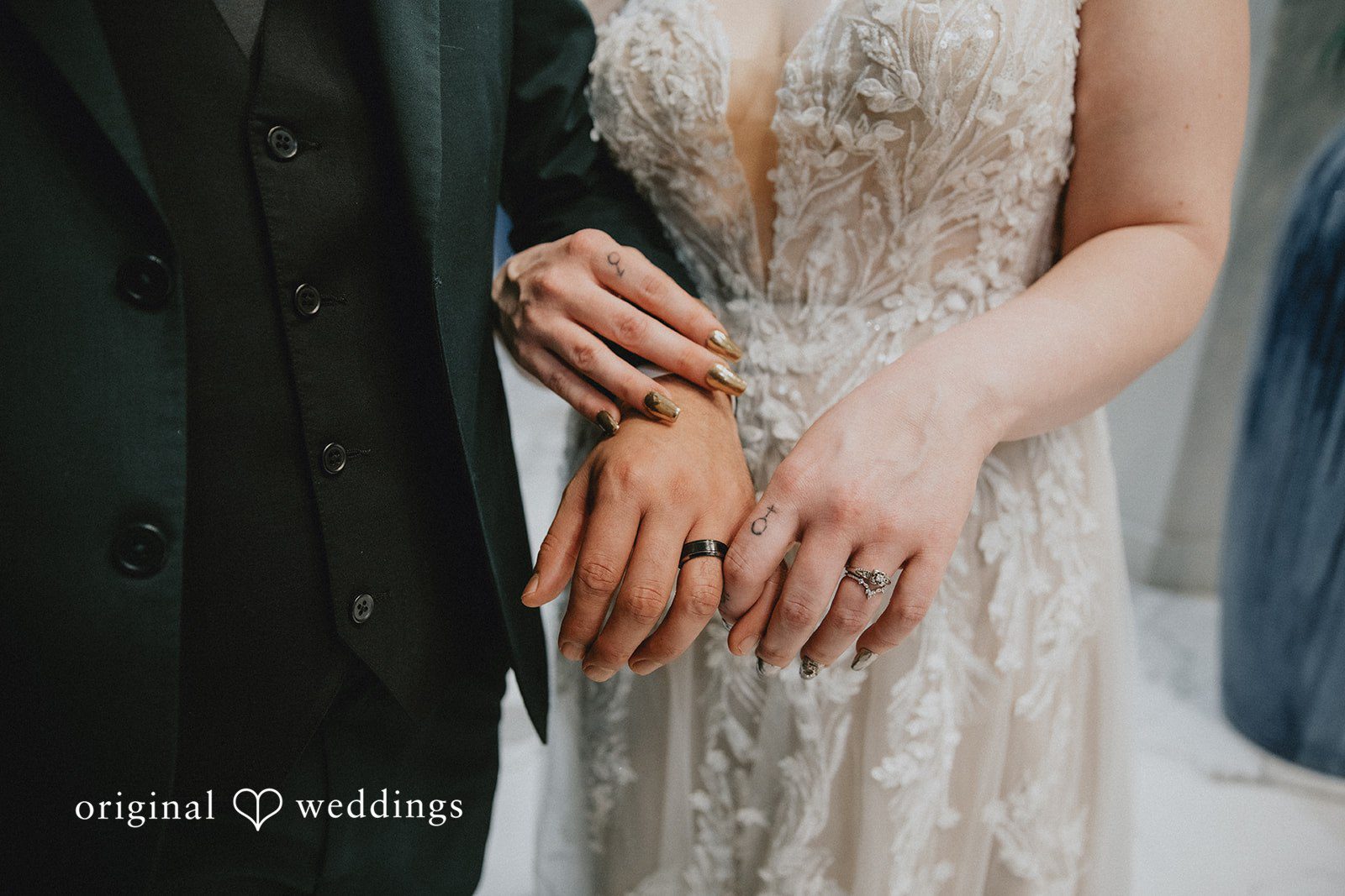 Allison + Justin Close-up of wedding rings on the couple's hands at DoubleTree by Hilton Corpus Christi Beachfront