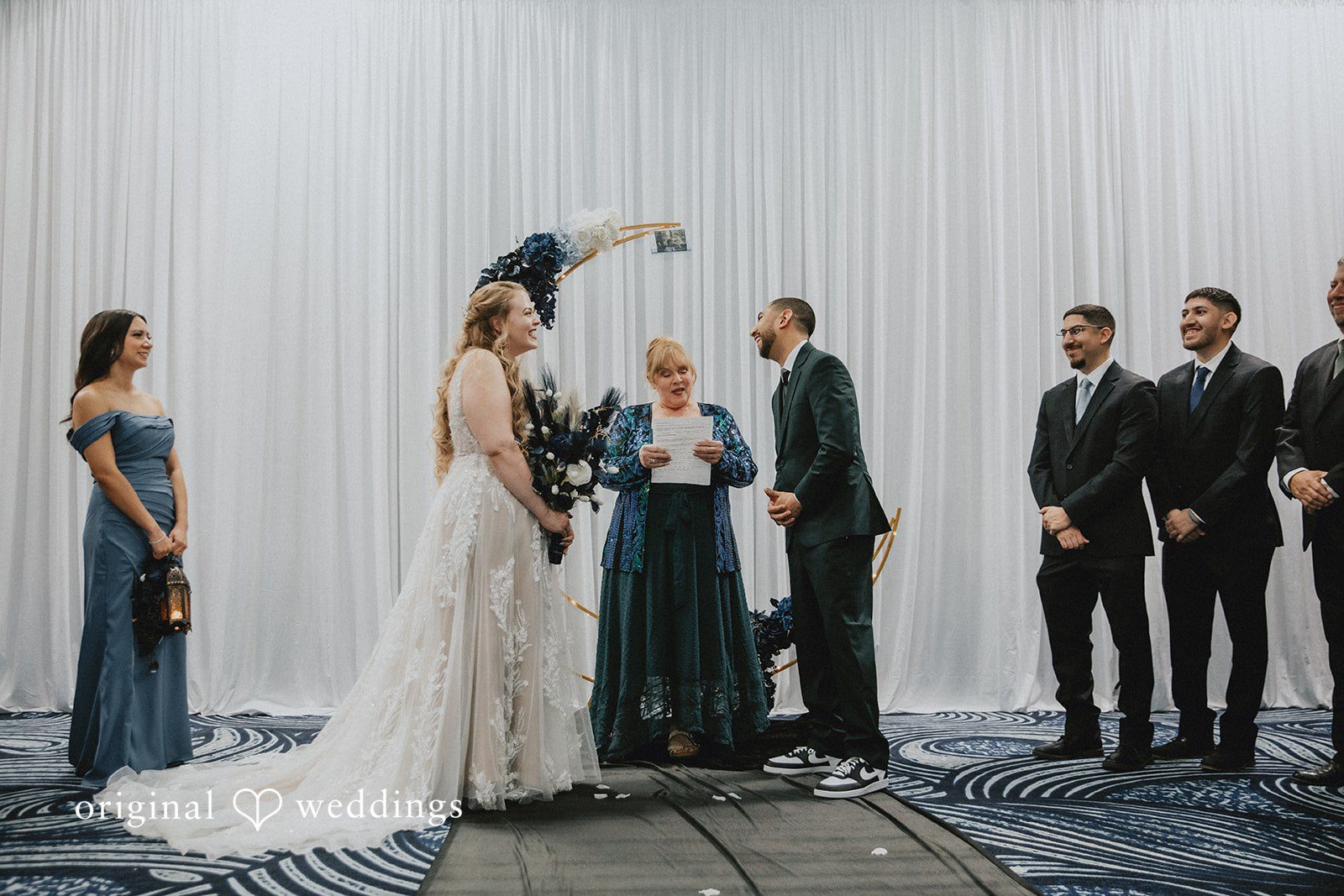 Allison + Justin San Antonio Wedding Photographers capturing couple standing before the priest at DoubleTree by Hilton Corpus Christi Beachfront by Original Weddings