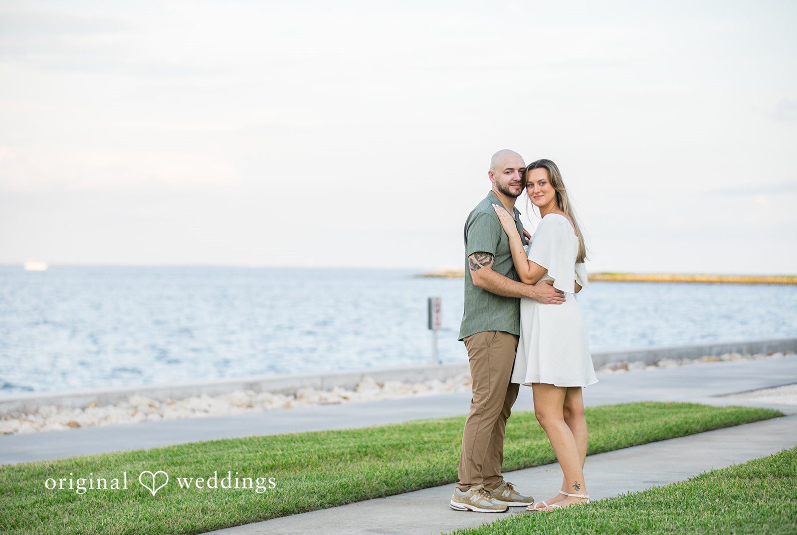 by Engagement photography services from Original Weddings capturing the Stunning Portrait of couple at Downtown St. Petersburg