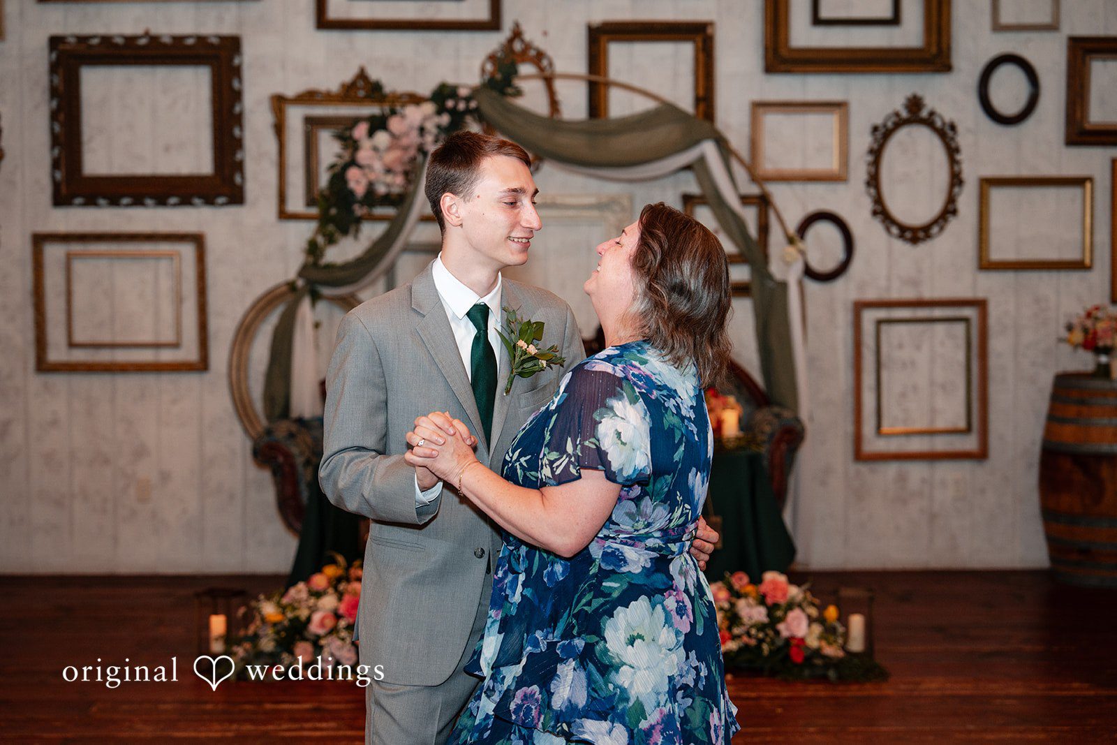 Conner + Ashley A groom dancing with an older woman in a blue patterned dress.