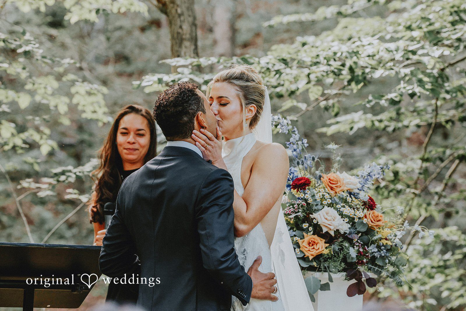 Bride and groom sharing a kiss at Full Moon Resort.