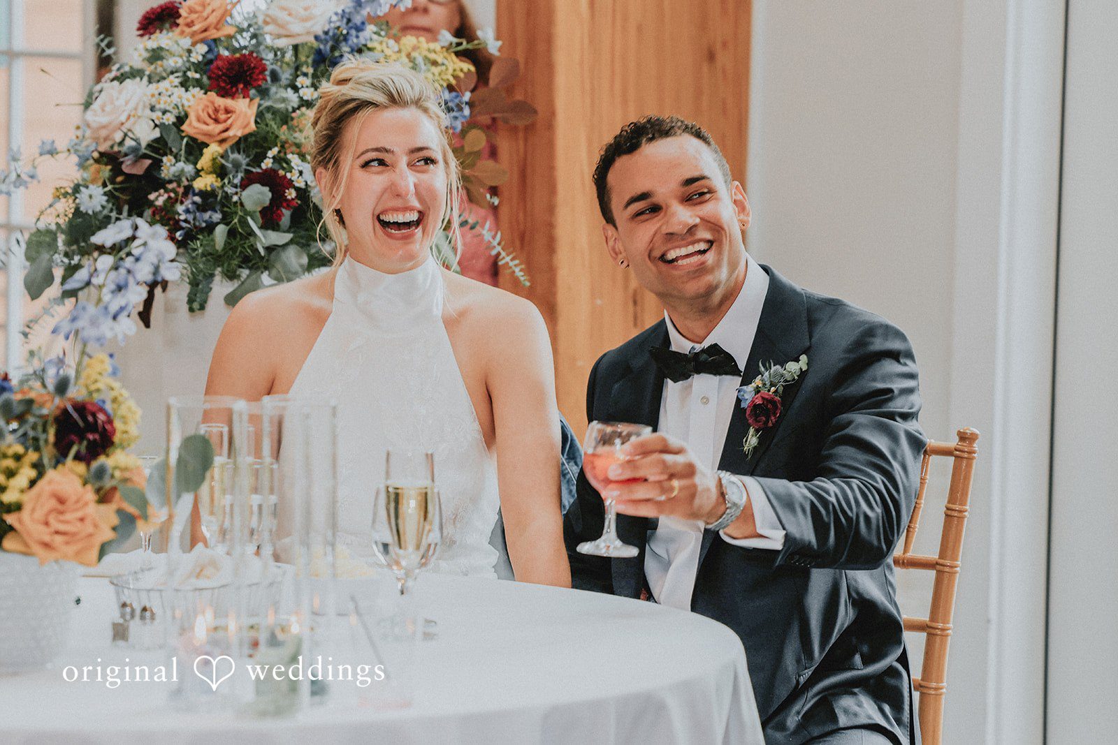 Bride and groom smiling at Full Moon Resort .