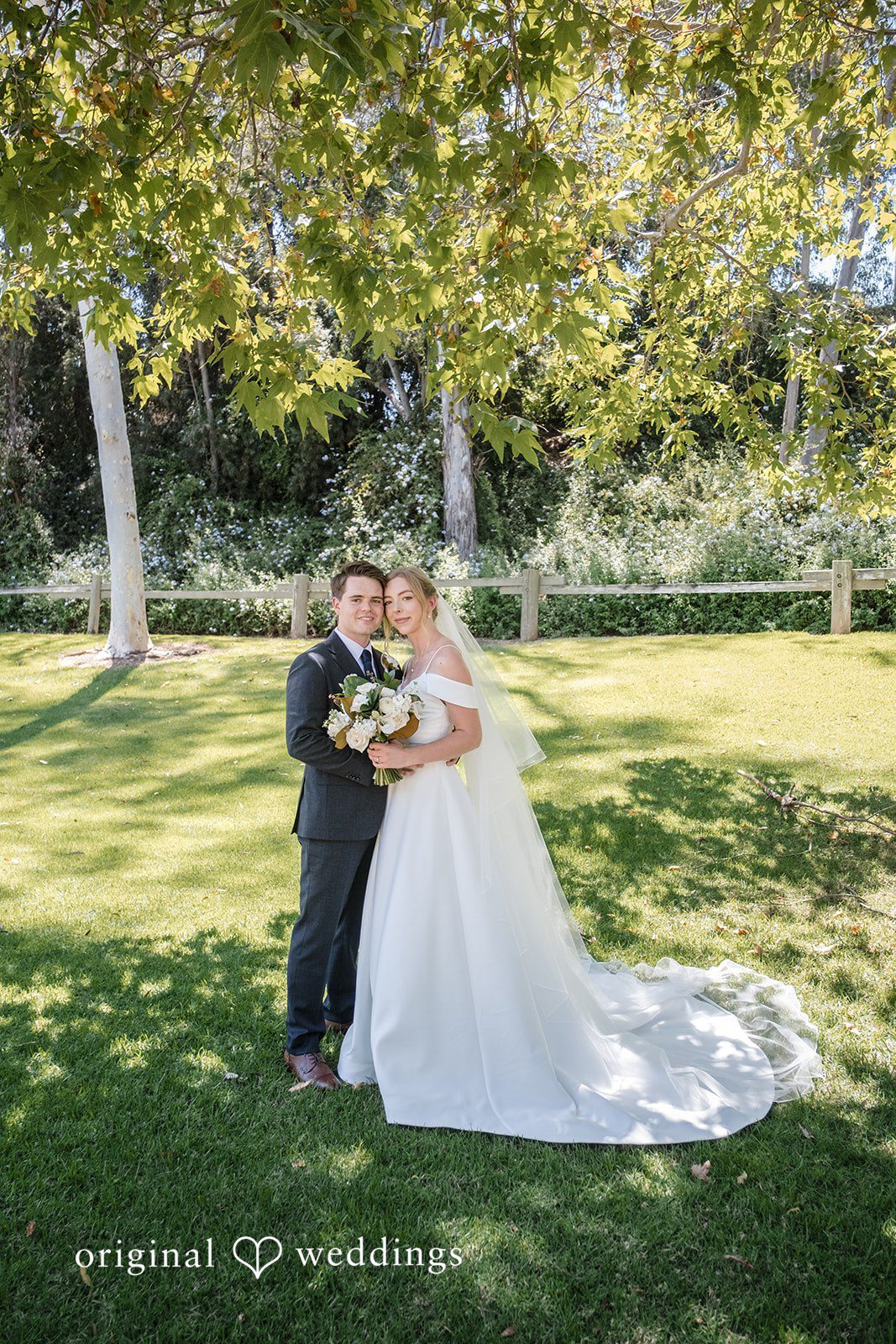Madeline + Brady Couple smiling outside at Fullerton Community Center captured by Los Angeles Wedding Photographers from Original Weddings.