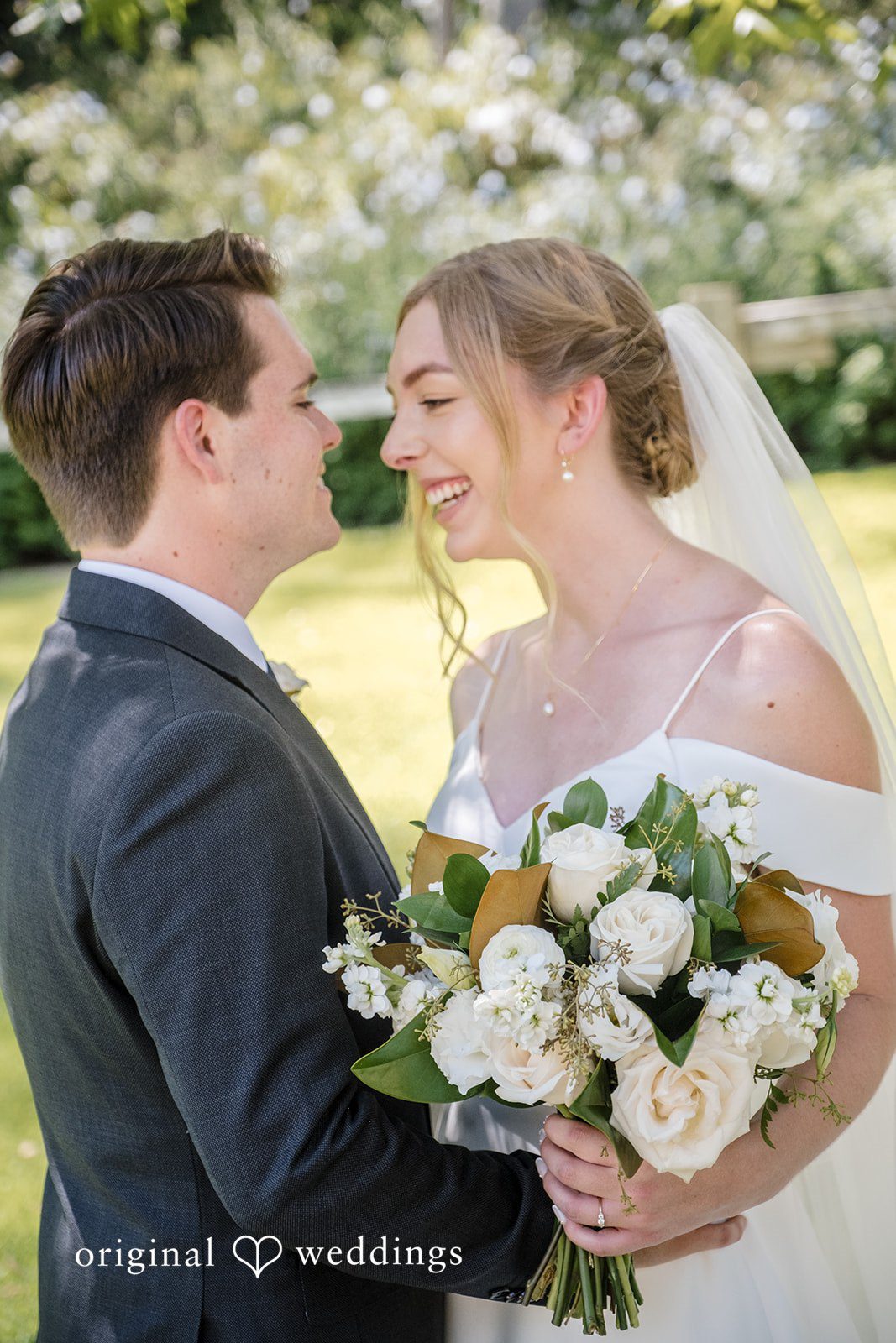 Madeline + Brady Joyful wedding portrait capturing the happiness of the newly married couple