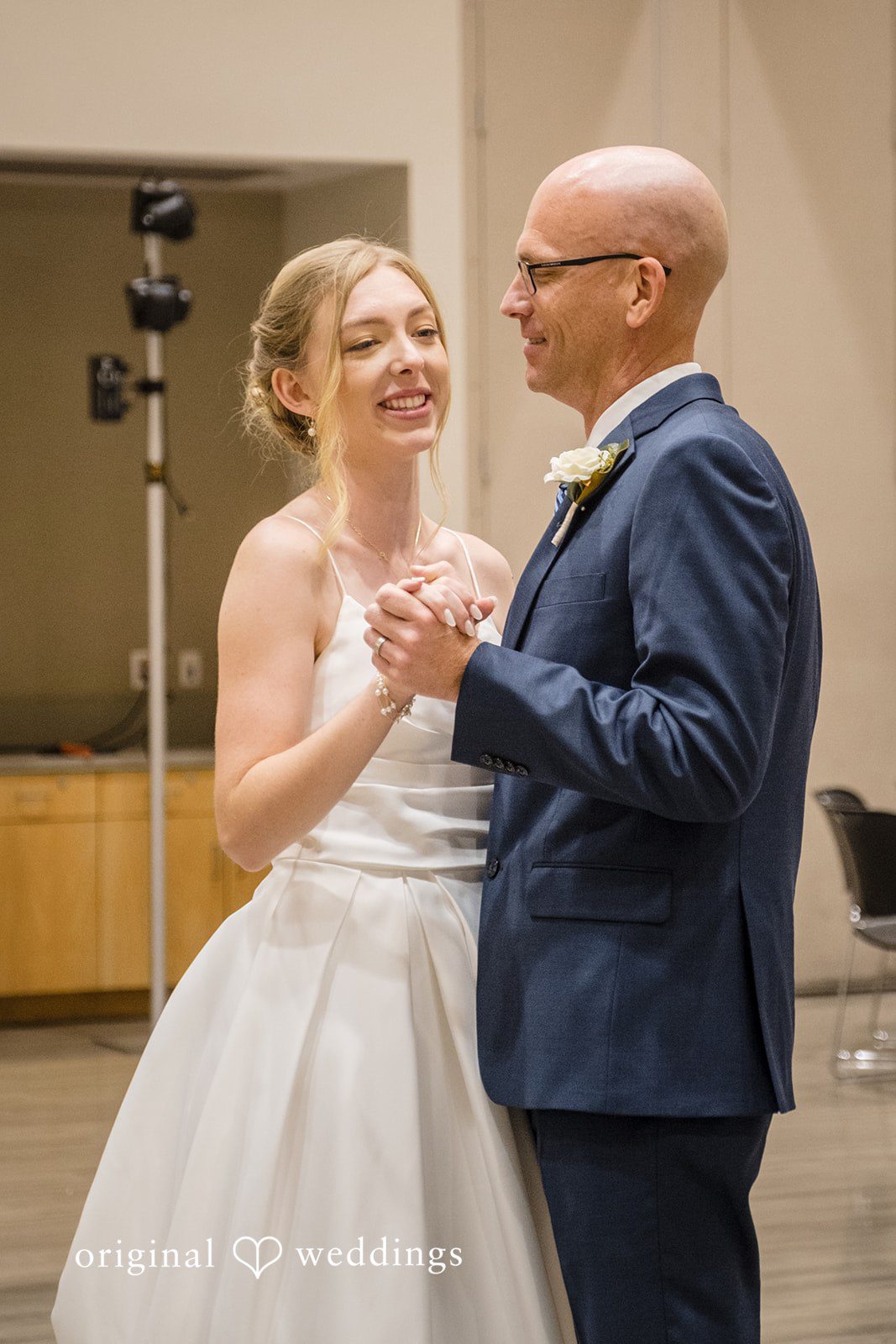 Madeline + Brady Bride sharing a joyful dance with a loved one during the reception.