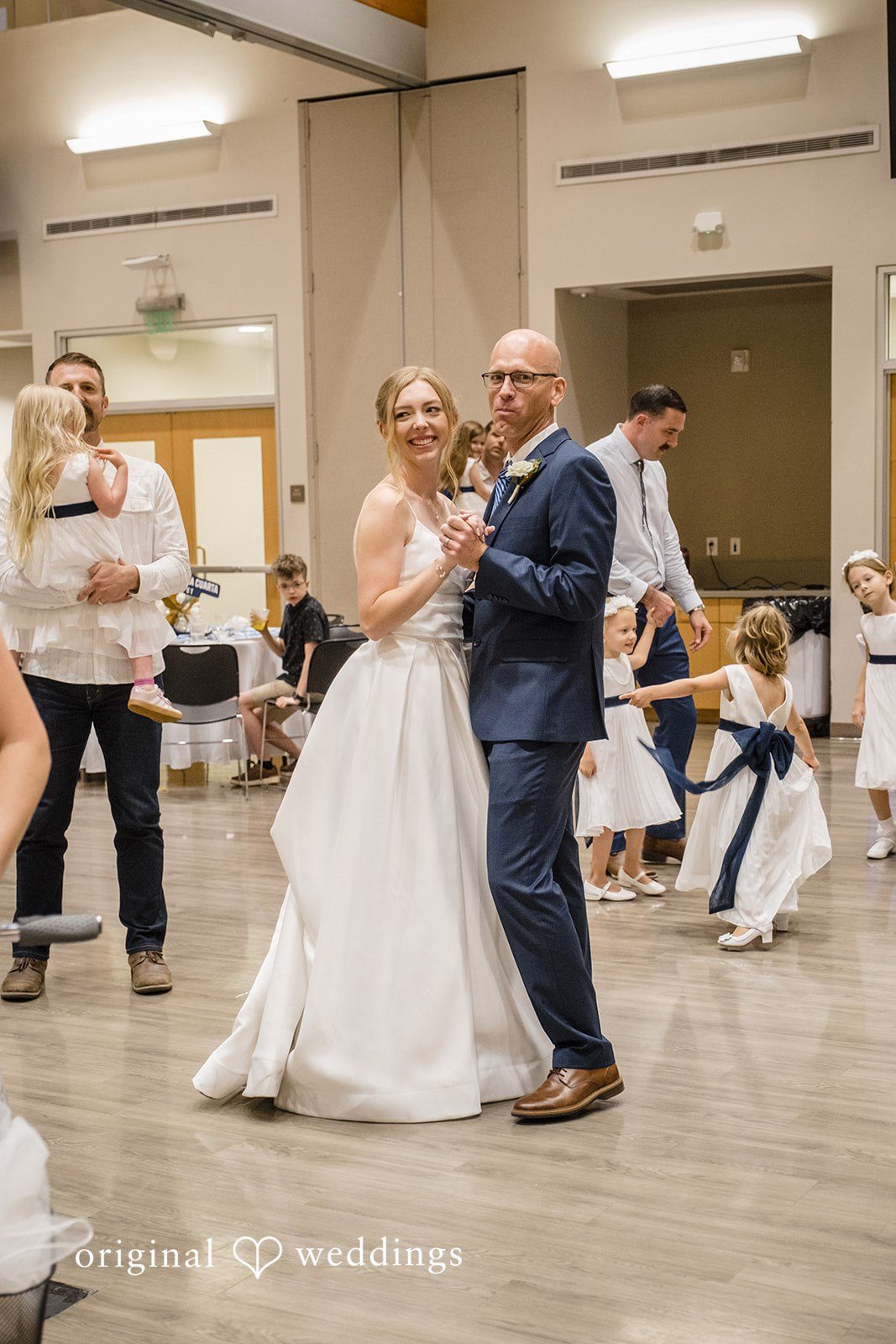 Madeline + Brady Bride dancing at Fullerton Community Center captured by Los Angeles Wedding Photographers from Original Weddings.