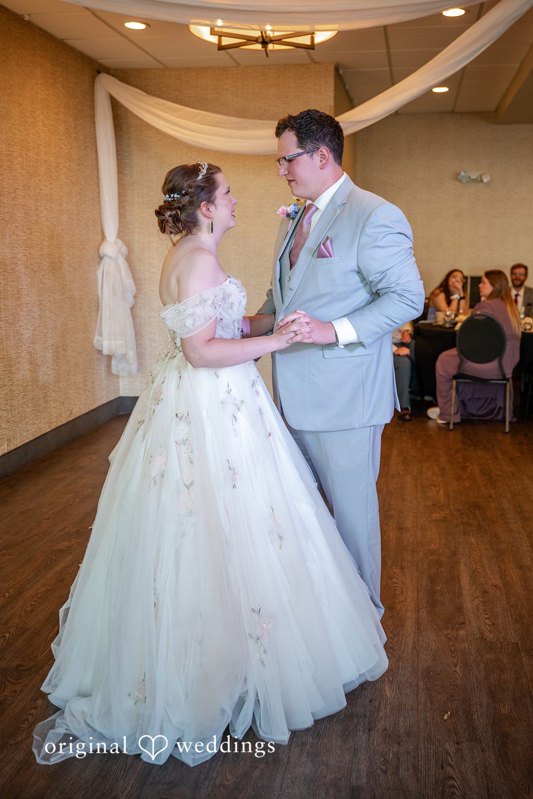Nina + Steven Bride and groom sharing their first romantic dance after wedding ceremony