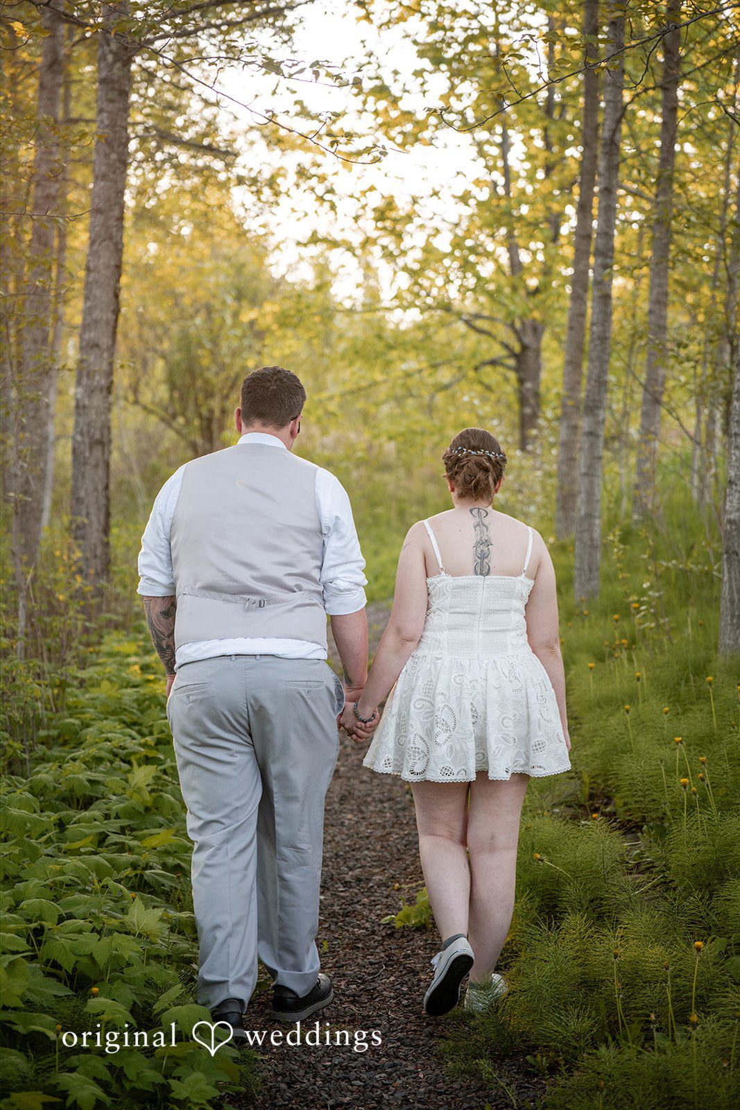 Nina + Steven Bride and groom captured from backside while walking away