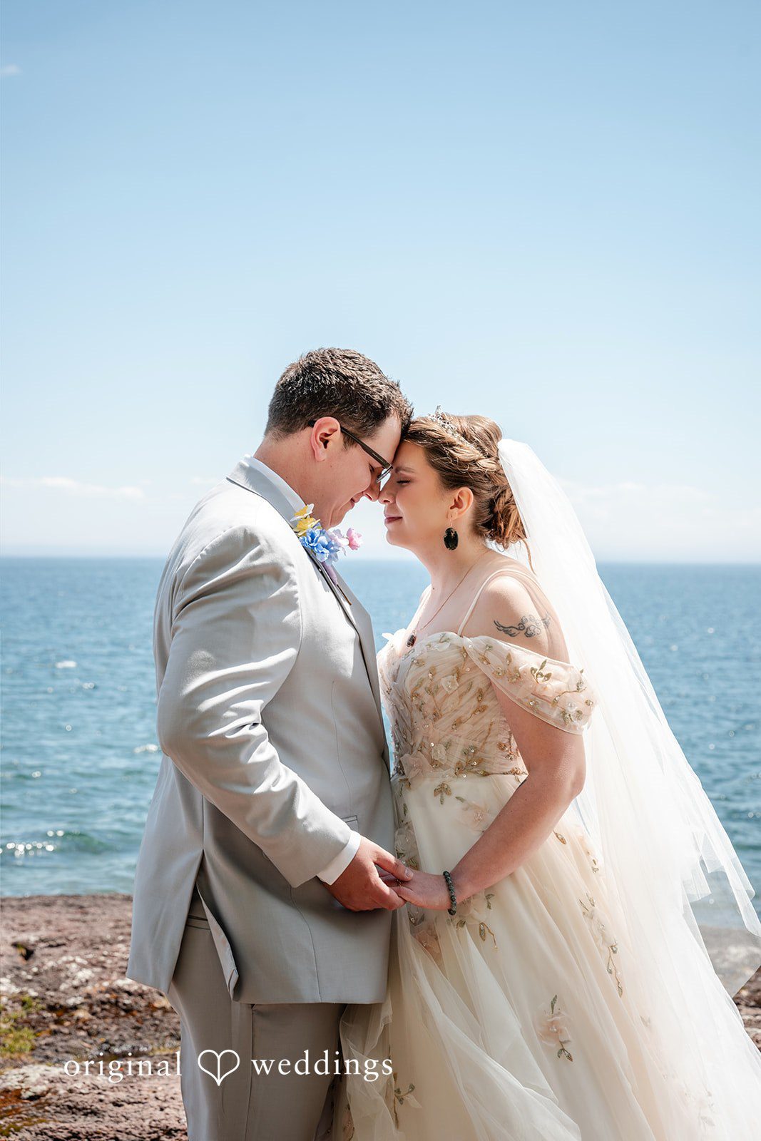 Nina + Steven Couple posing for wedding photography at Grand Superior Lodge