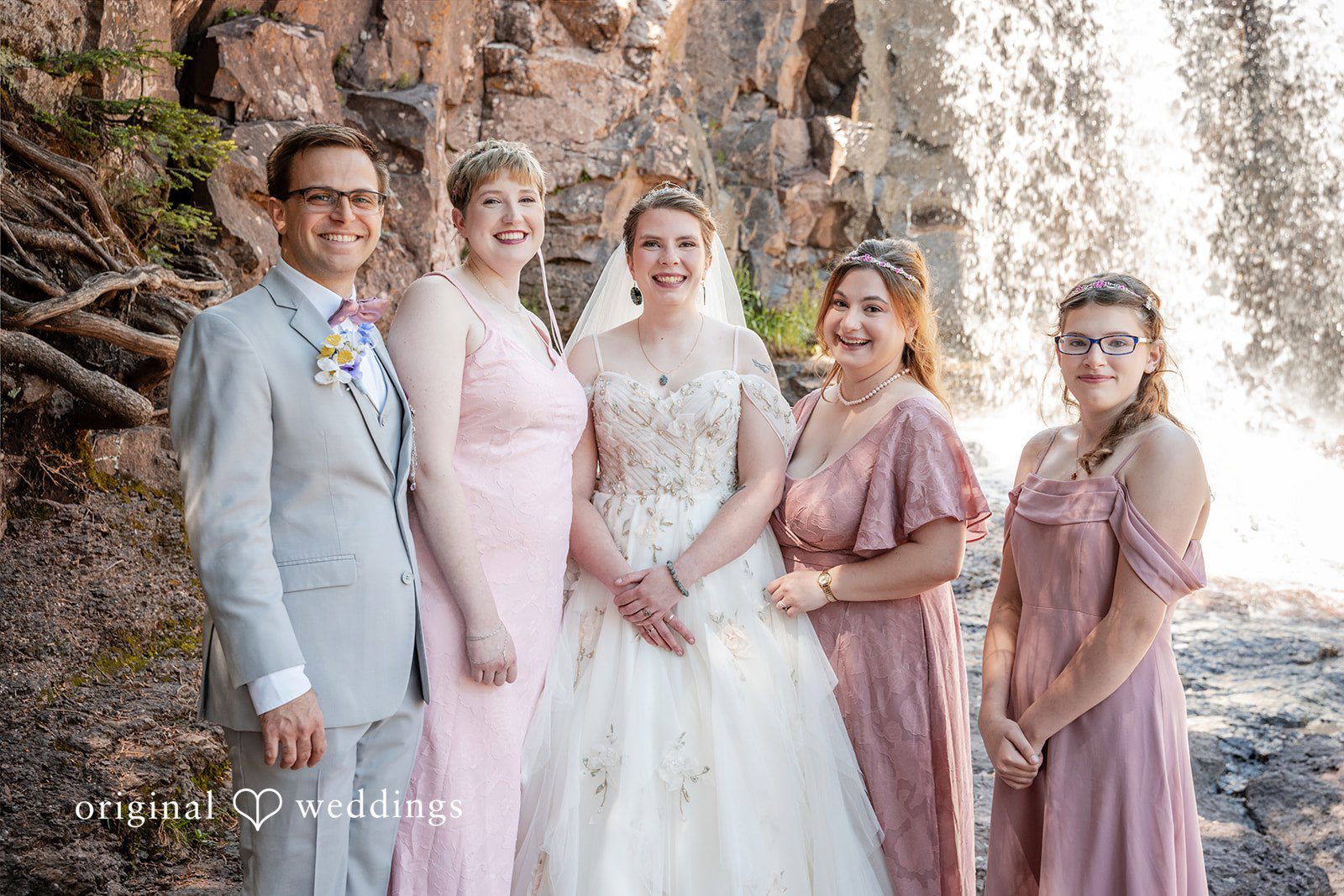 Nina + Steven Lovely picture of bride with family and friends