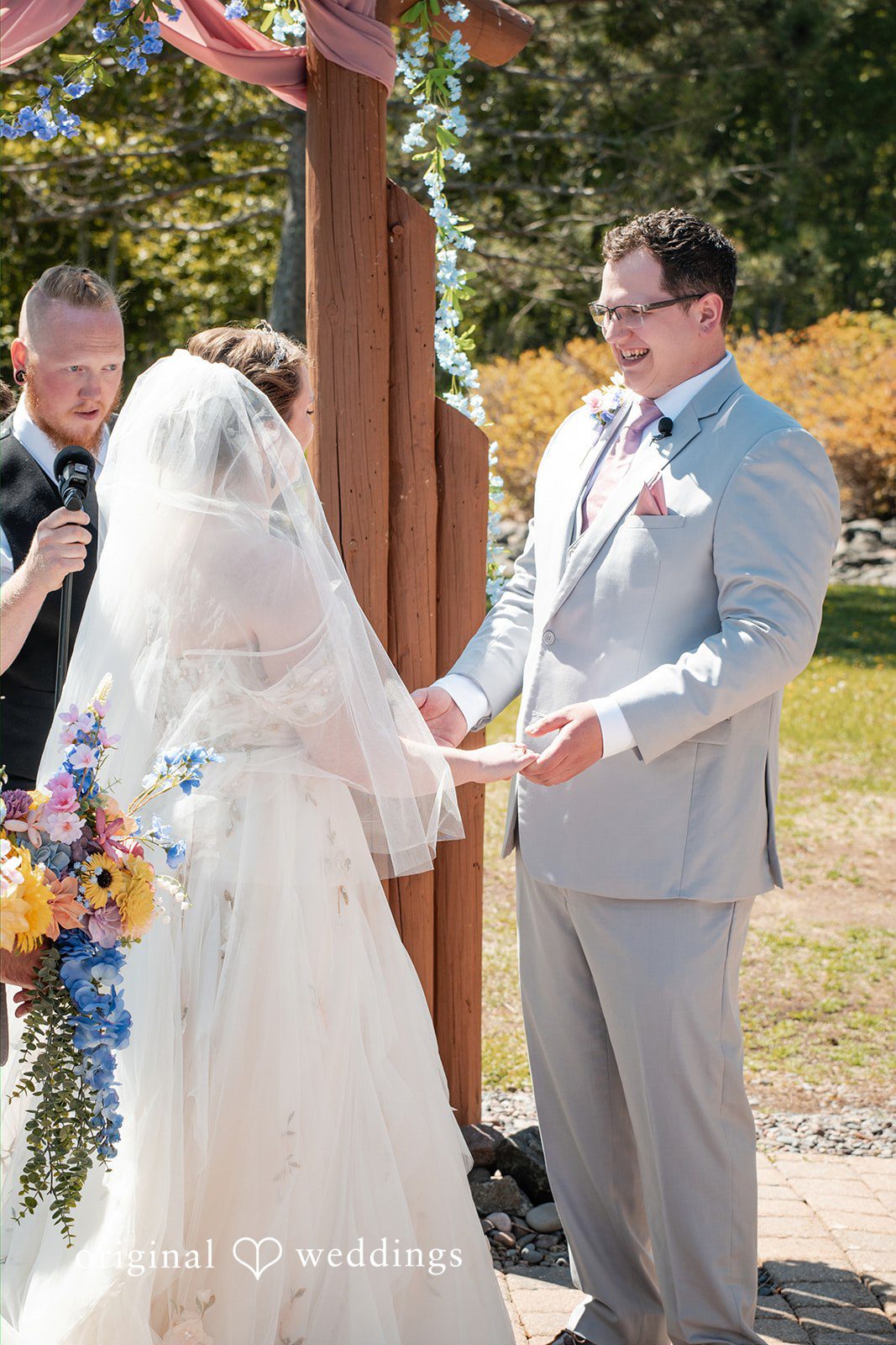 Nina + Steven Couple exchanging vows during the ceremony
