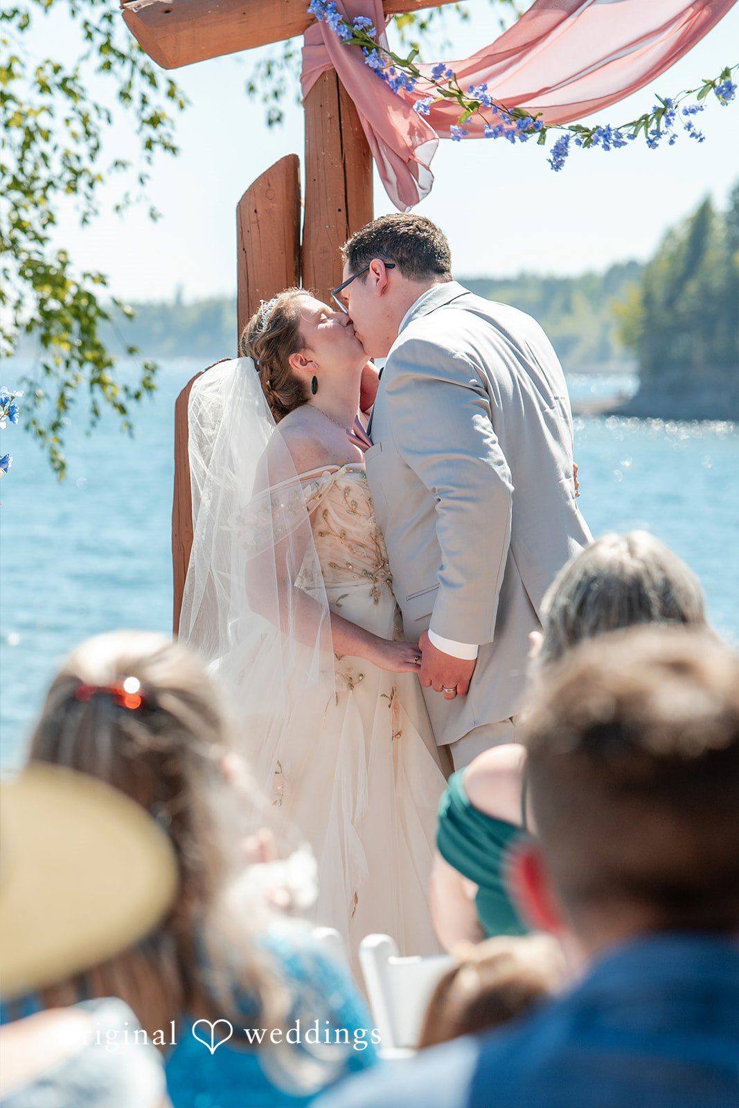 Nina + Steven Couple sharing a romantic kiss at Grand Superior Lodge