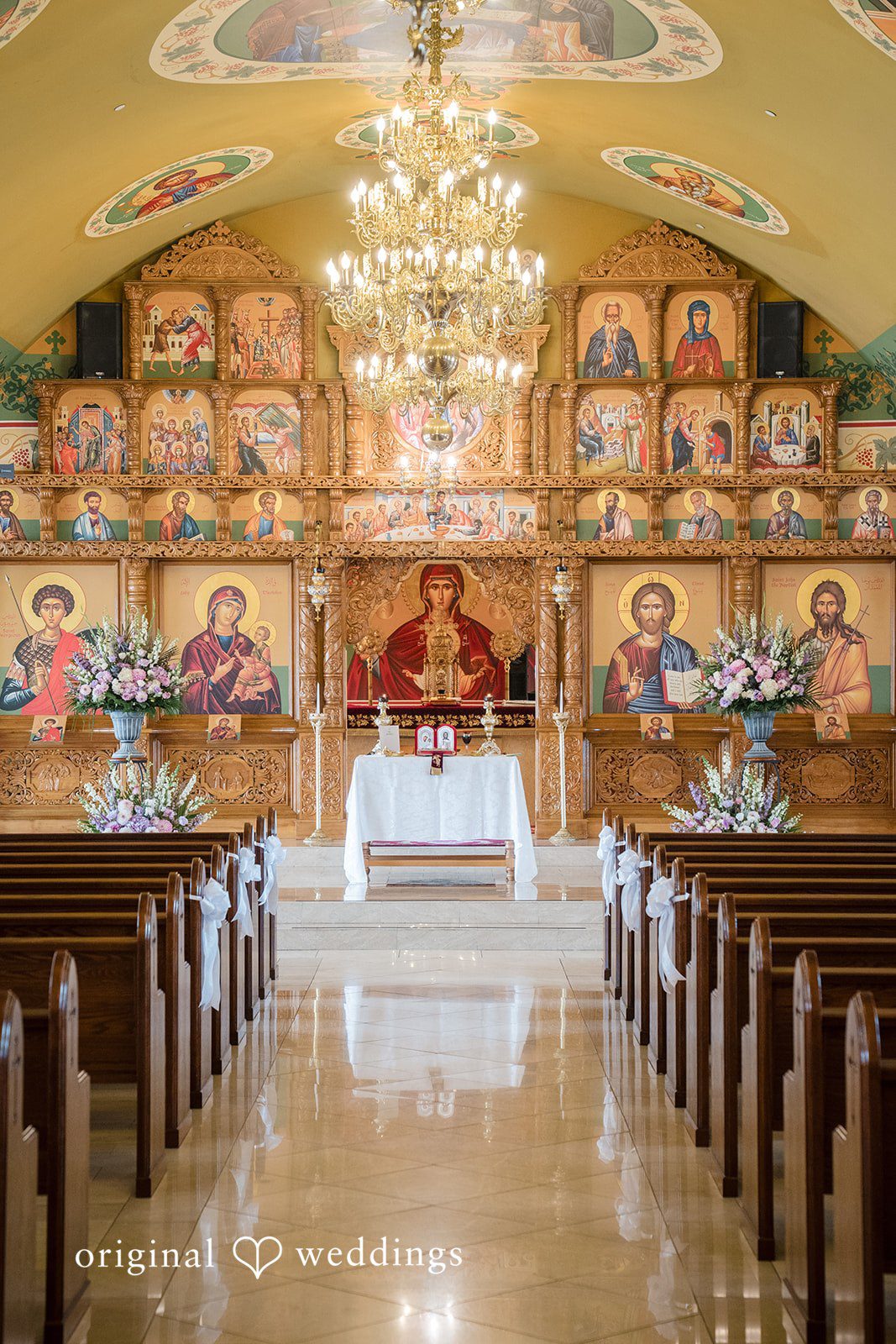 Janelle + Yaser Beautiful inner decoration of church for wedding ceremony