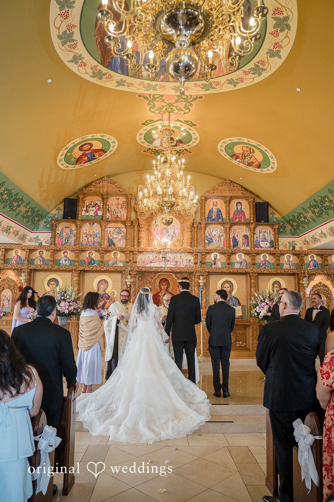 Janelle + Yaser Bride and groom exchanging vows during the wedding ceremony