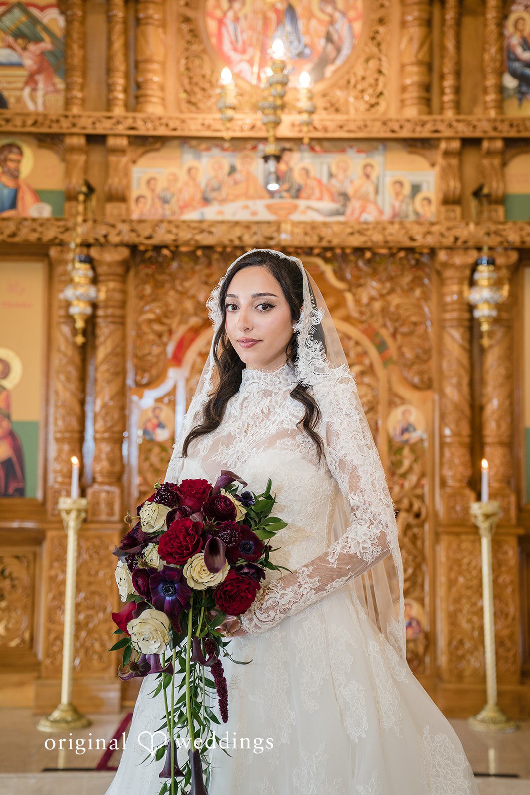 Janelle + Yaser Lovely portrait of bride at church holding bouquet