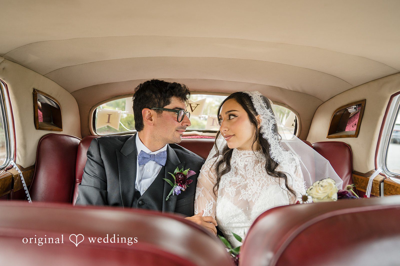 Janelle + Yaser Bride and groom looking towards each other with pure love